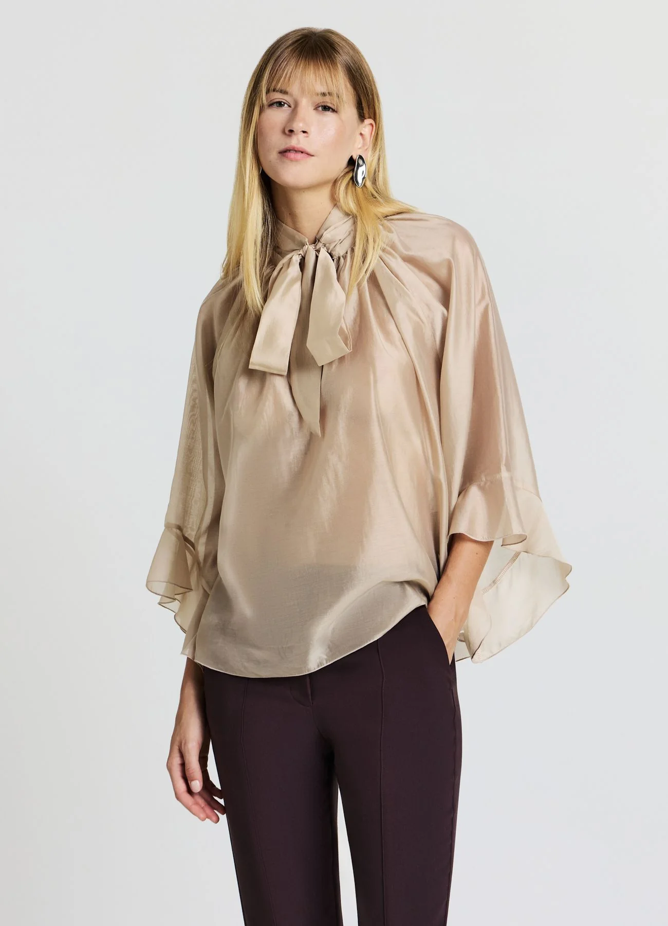 Blusa ampia con rouches
