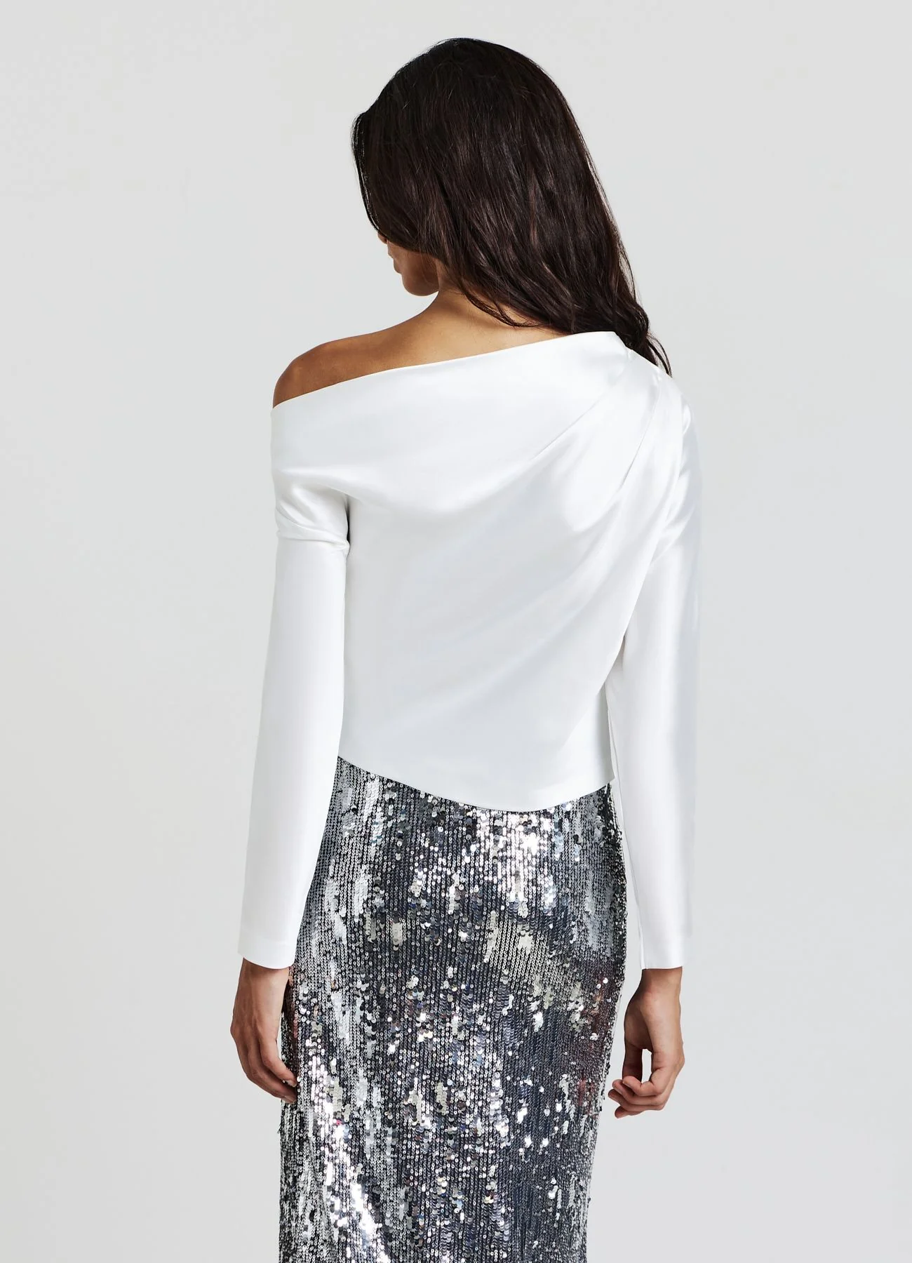 Blusa asimmetrica con drappeggio similsatin