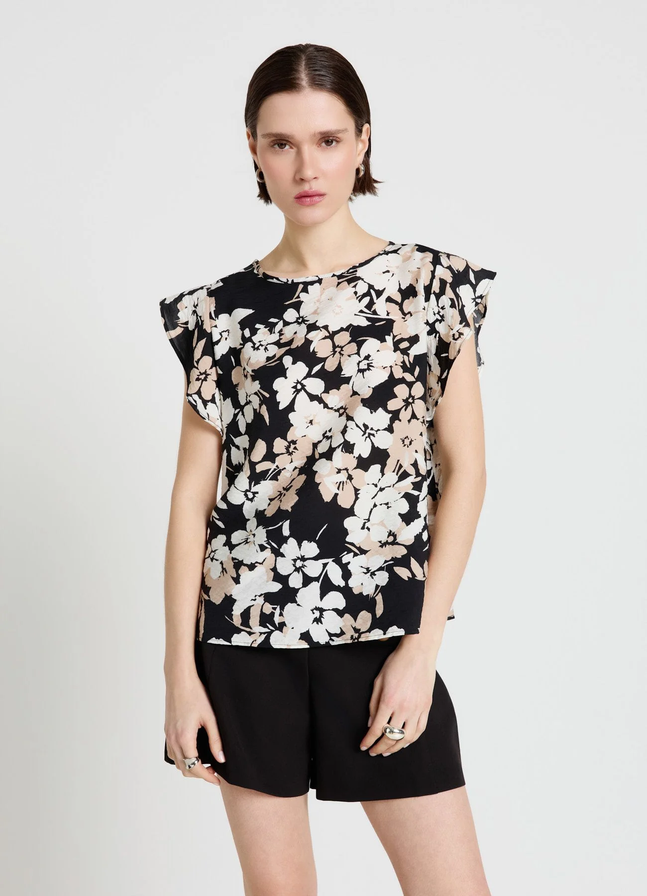Blusa con stampa floreale e maniche con rouches