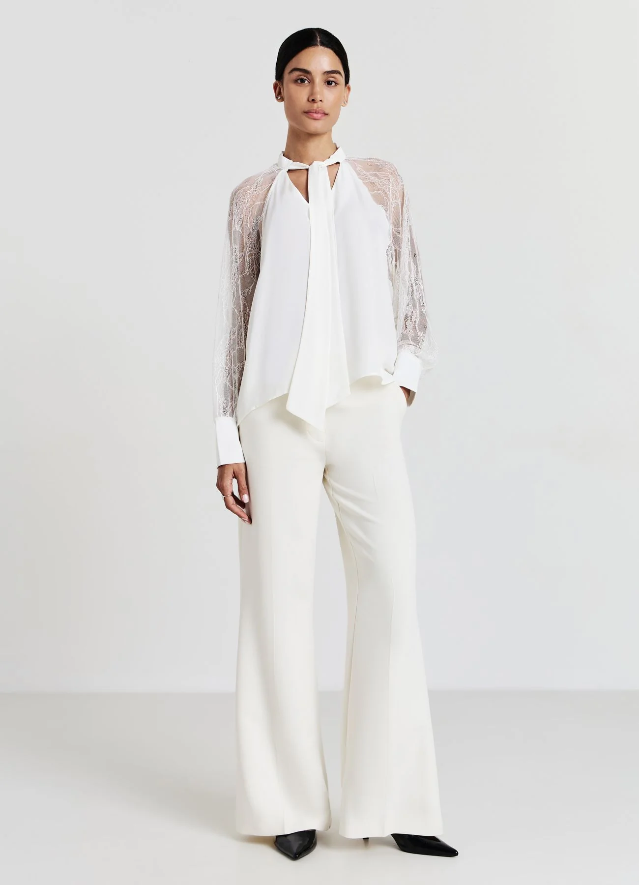 Blusa fiocco maniche pizzo
