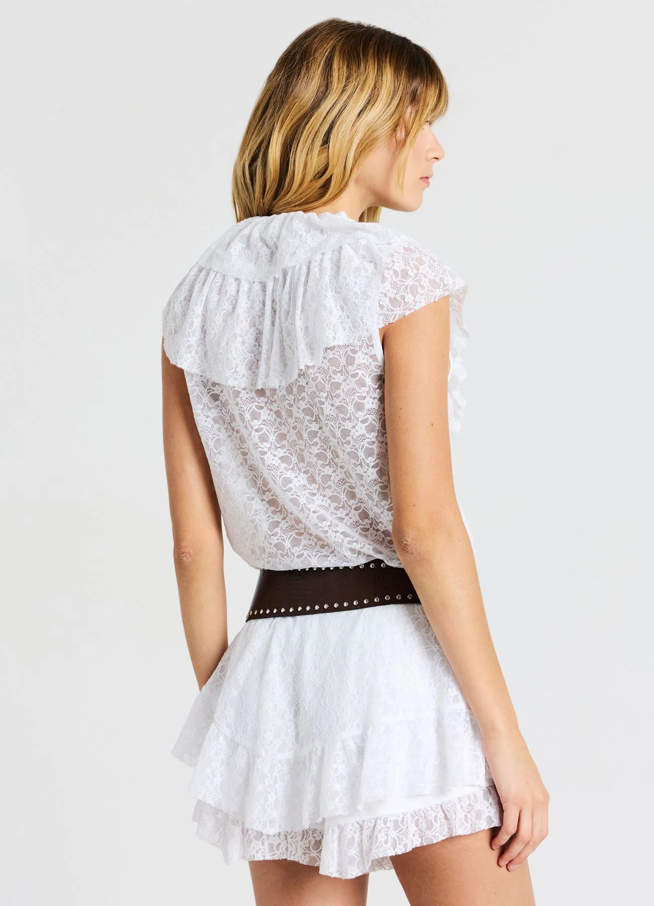Blusa pizzo con balza