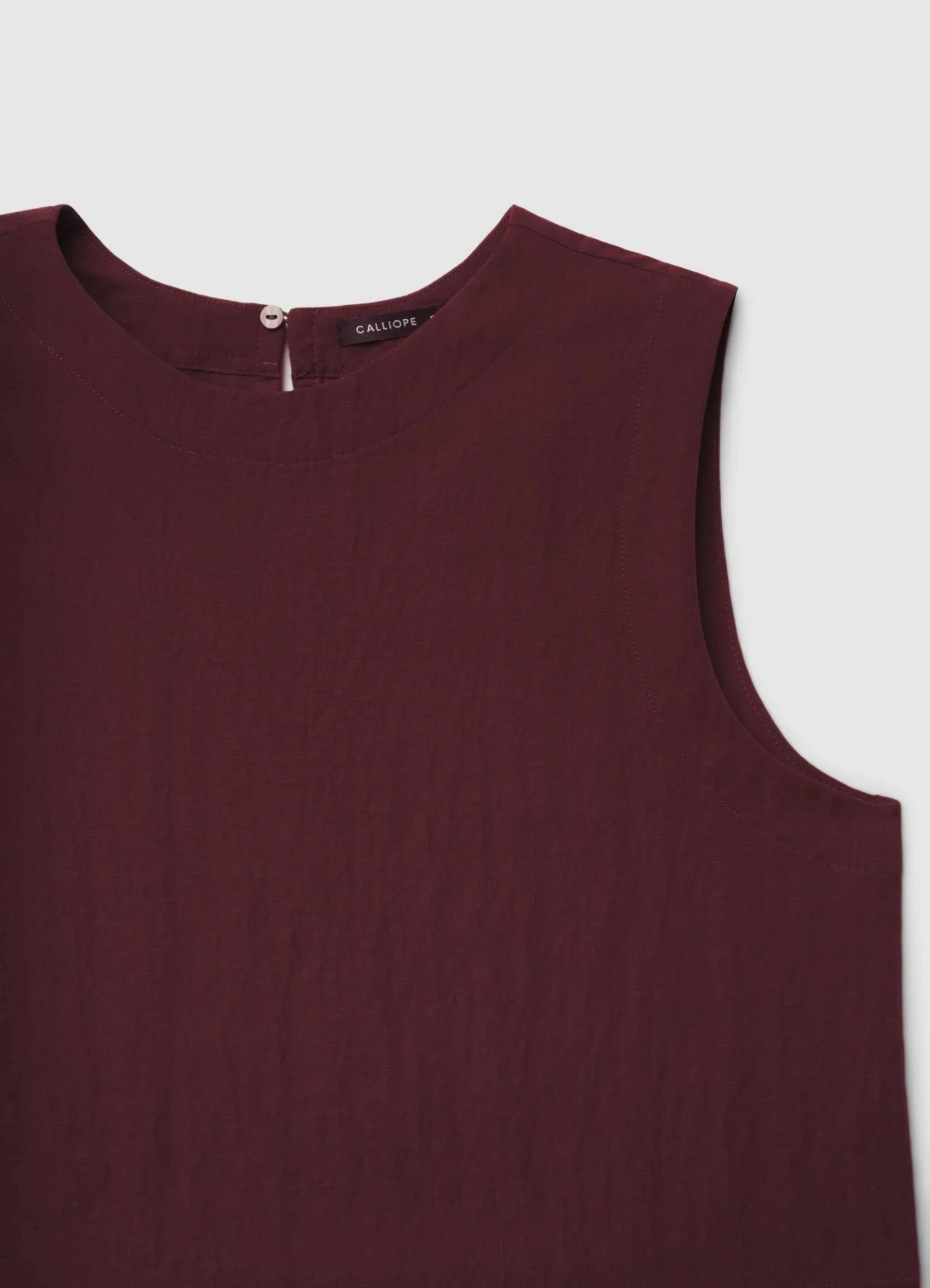 Blusa smanicata a tinta unita - Image 6