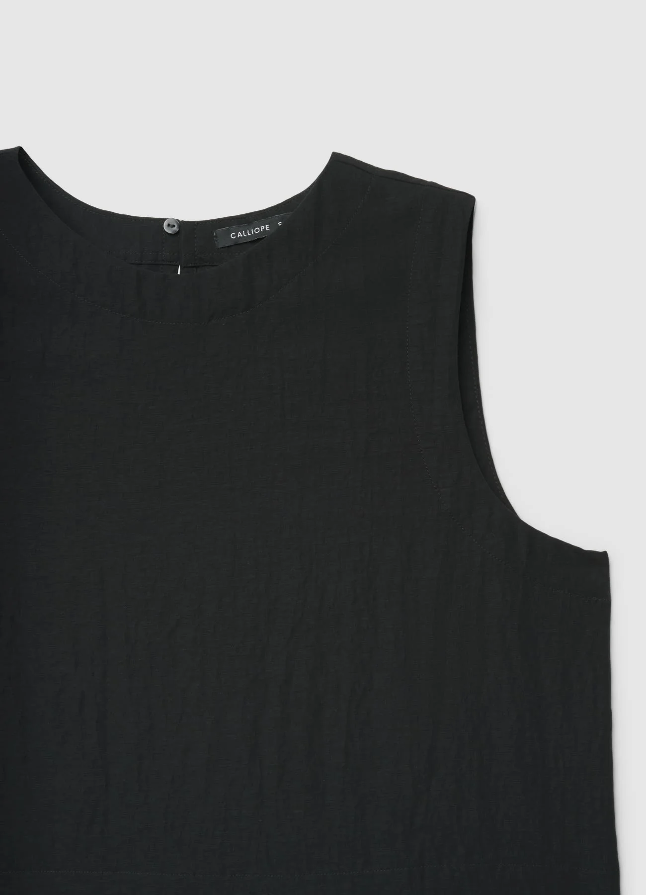 Blusa smanicata a tinta unita - Image 6