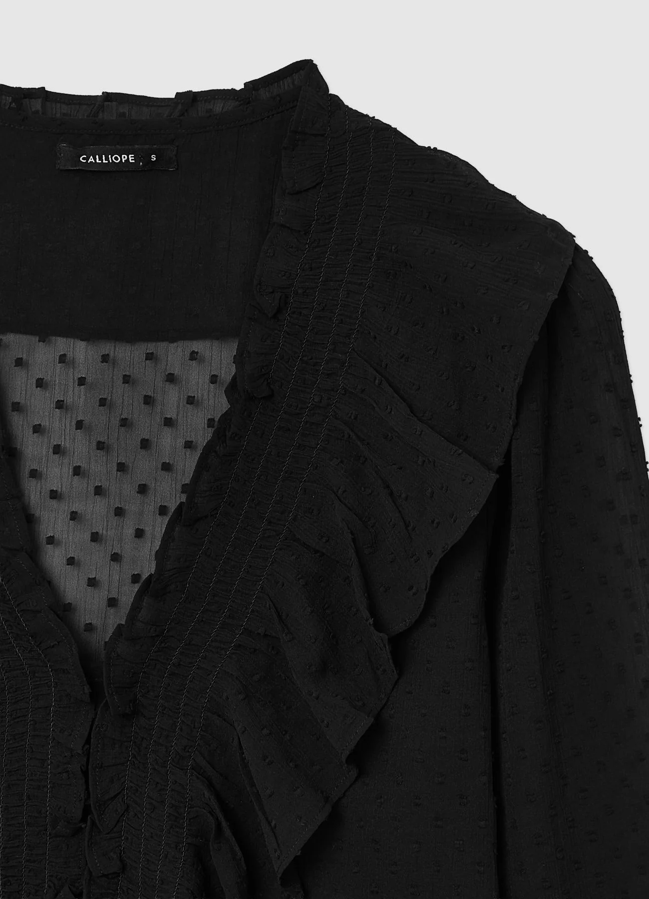 Blusa tinta unita con volant - Image 5