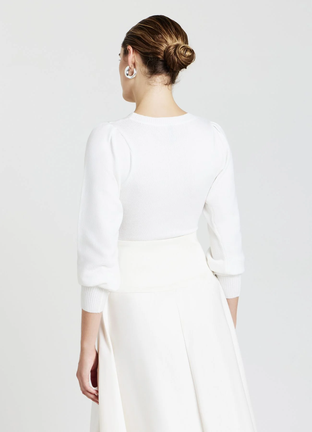 Body in maglia con trecce