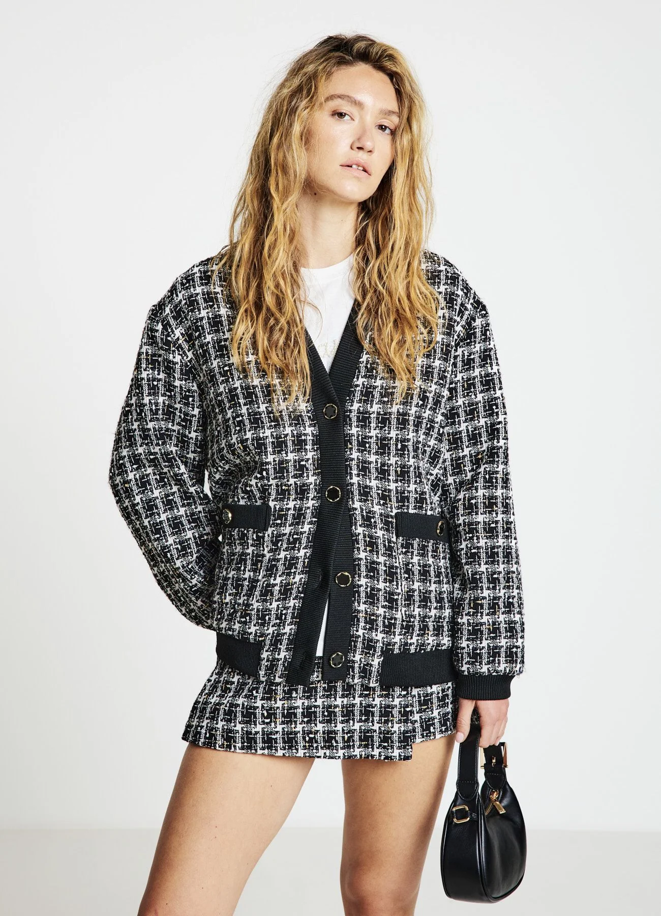 Bomber in tweed con bottoni