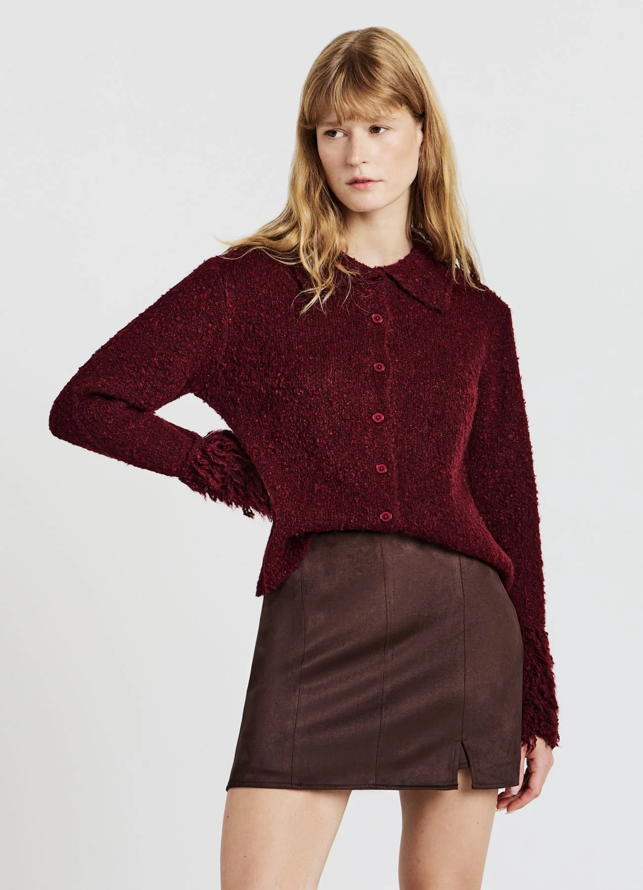 Cardigan bouclè con bottoni