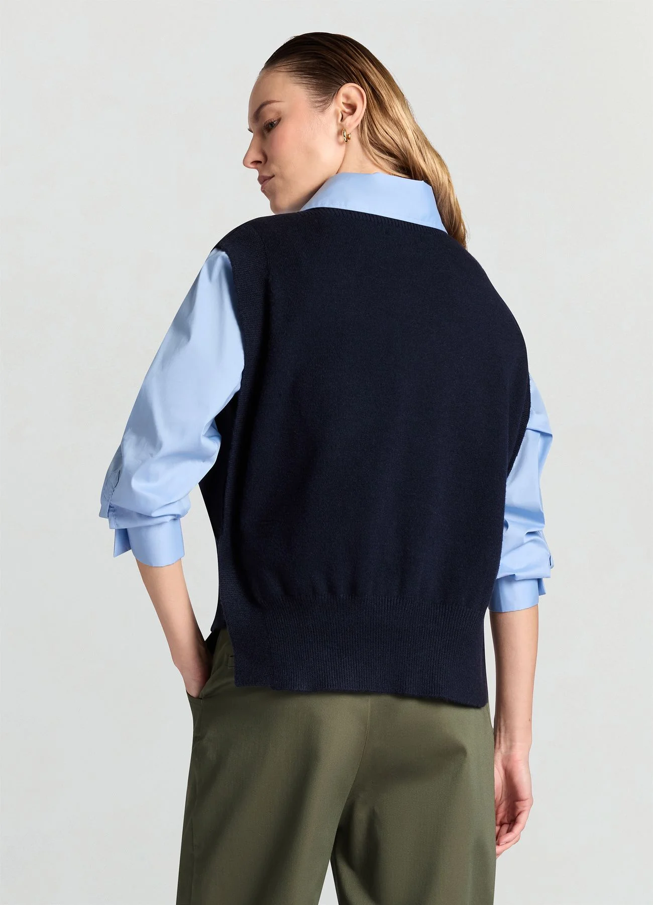 Gilet con bottoni laterali
