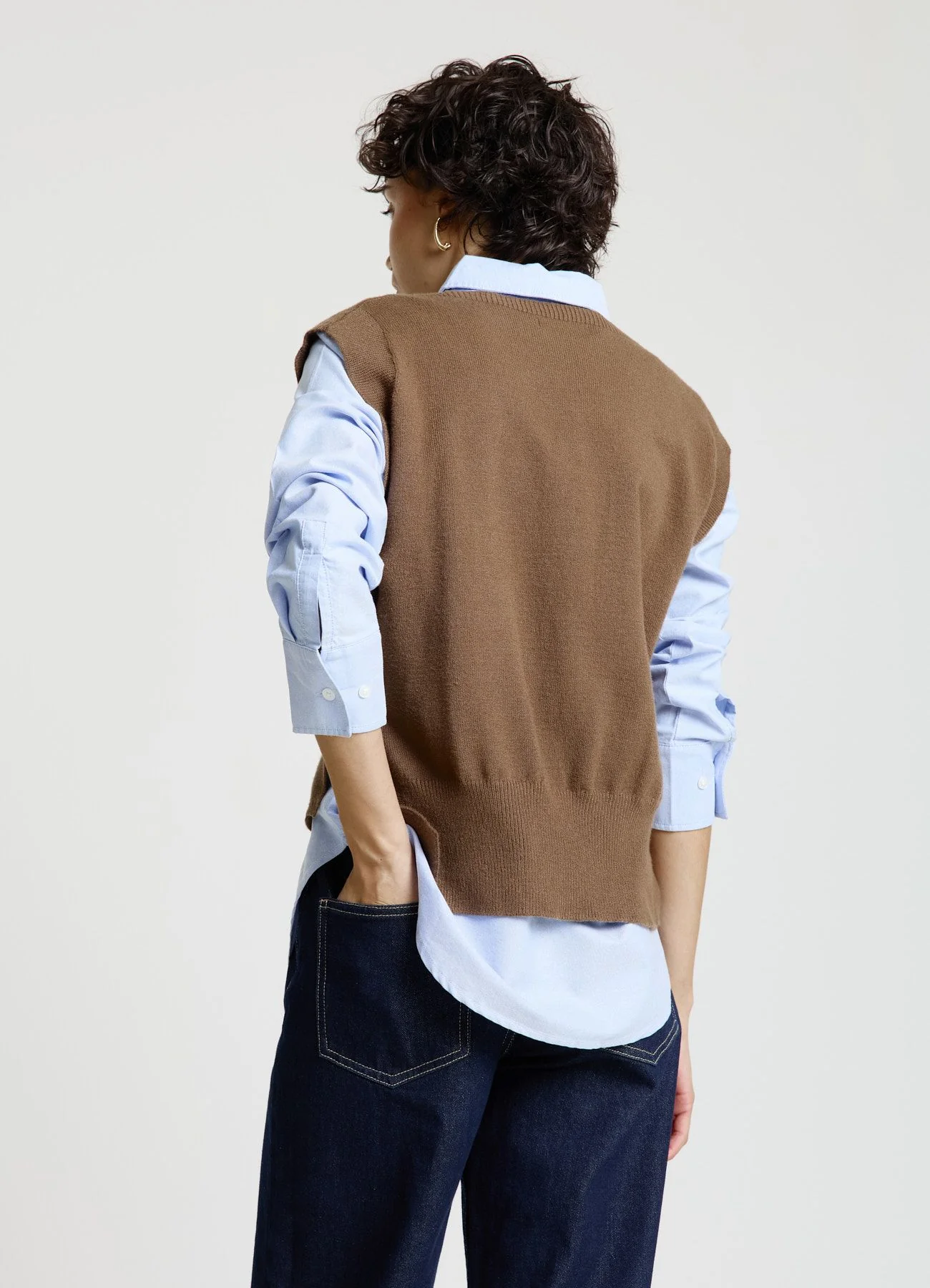 Gilet con bottoni laterali