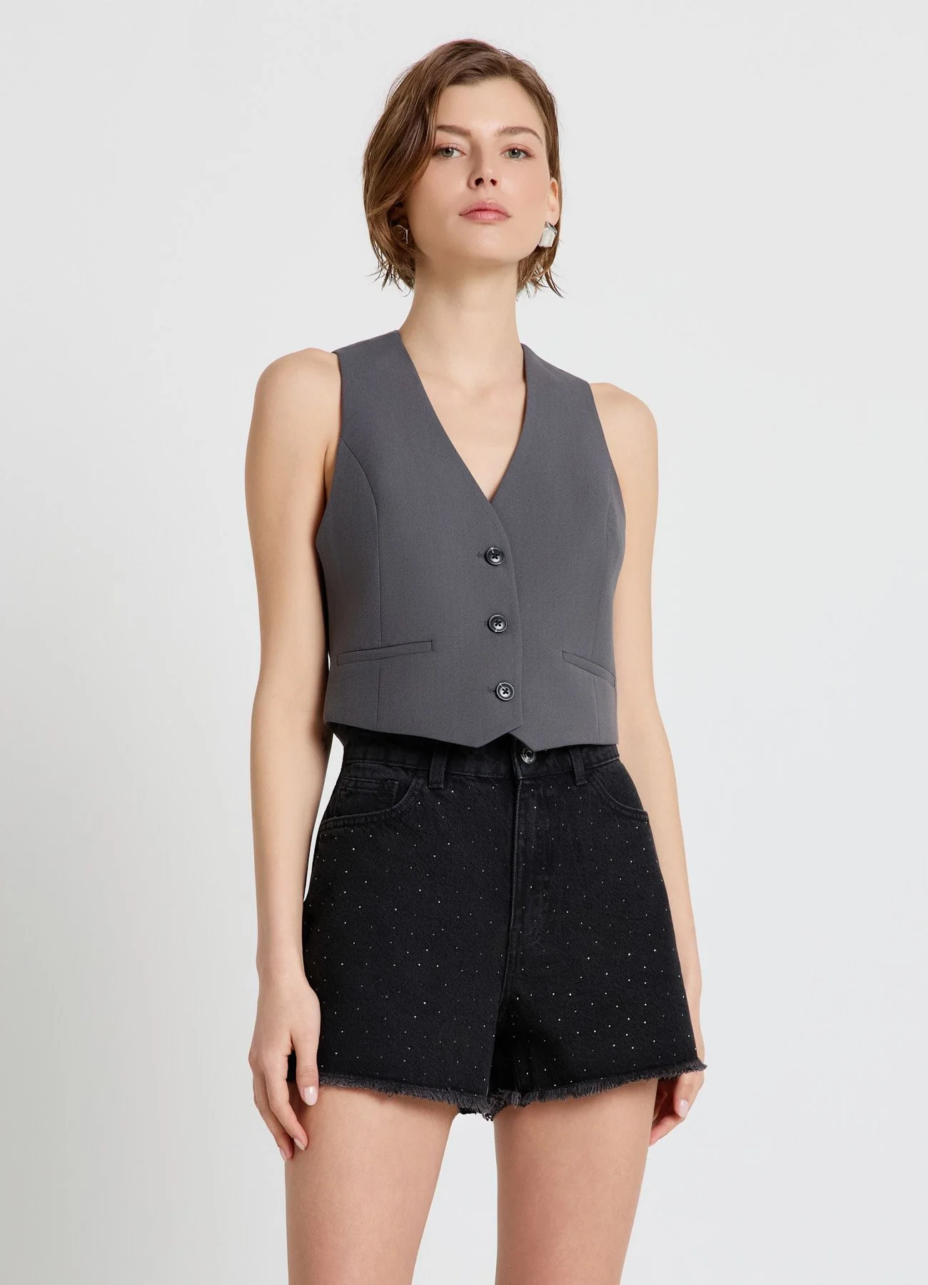 Gilet corto con bottoni