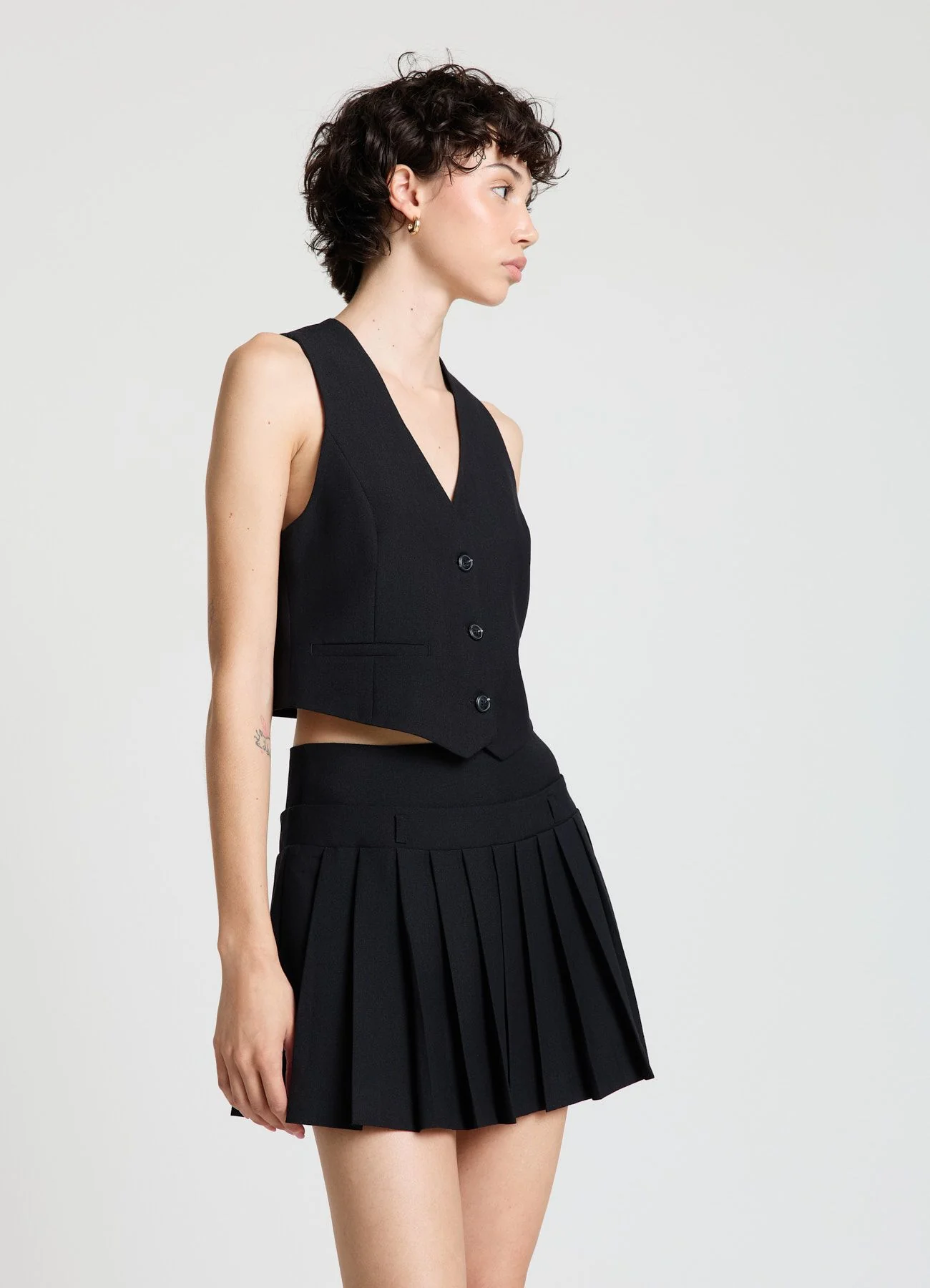 Gilet corto con bottoni