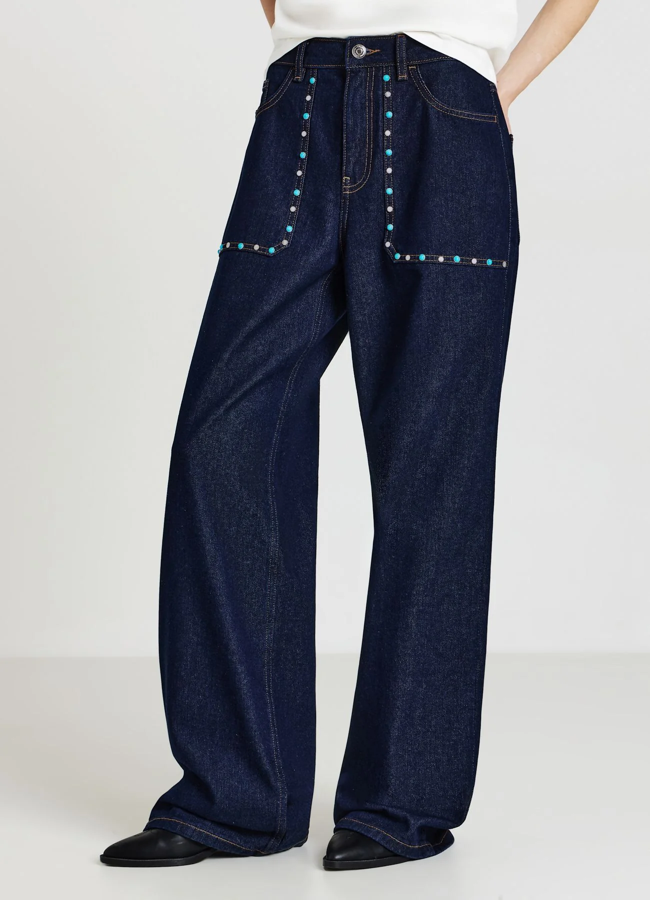 Jeans con borchie