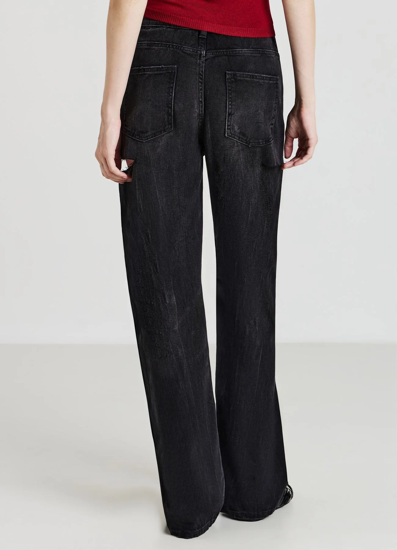 Jeans con strappi - Image 3