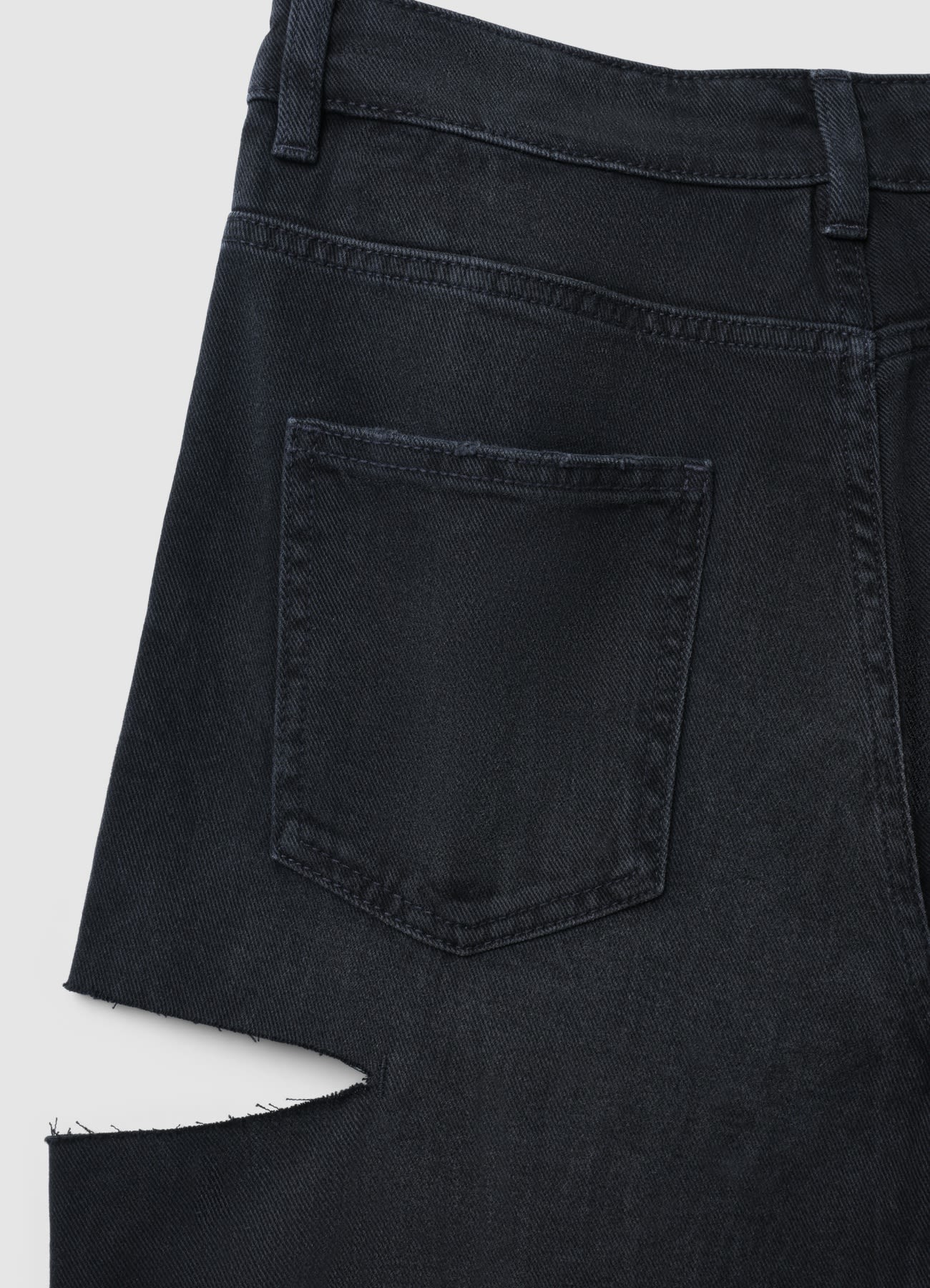 Jeans con strappi - Image 4