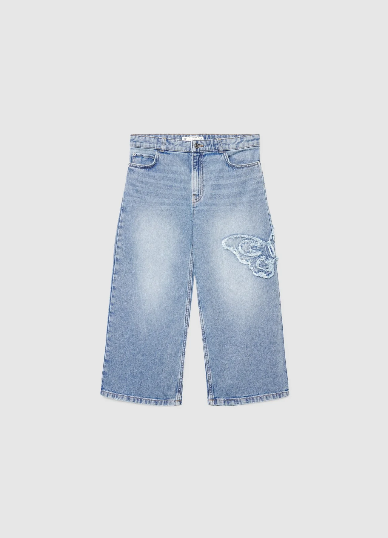 Jeans crop con applicazione farfalla - Image 3