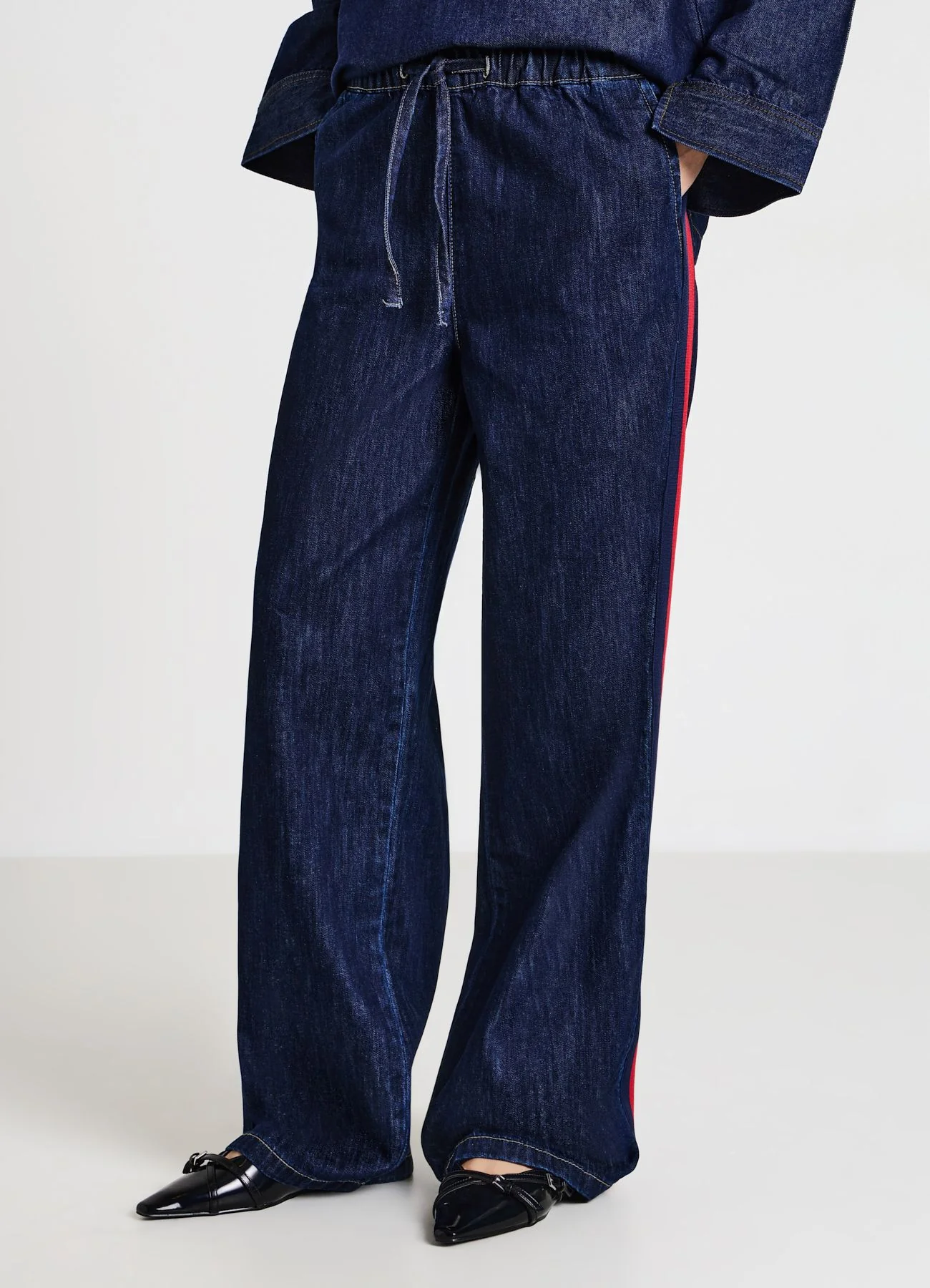 Jeans jogger con bande laterali - Image 3
