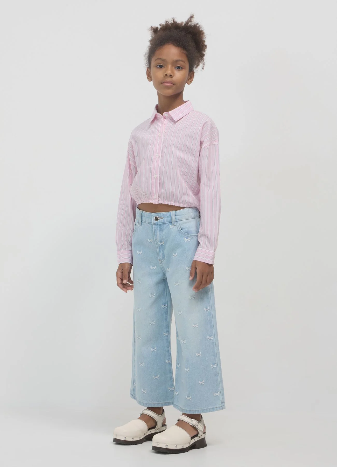 Jeans ricami fiocchi
