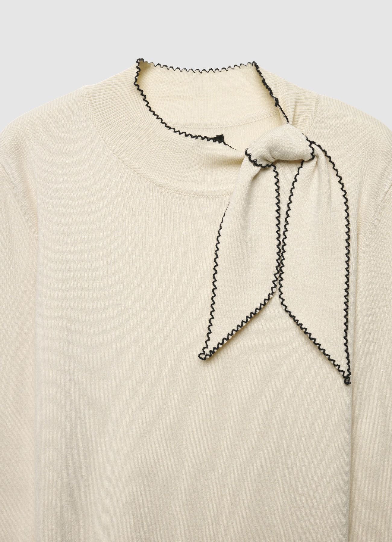 Maglia con fiocco al collo