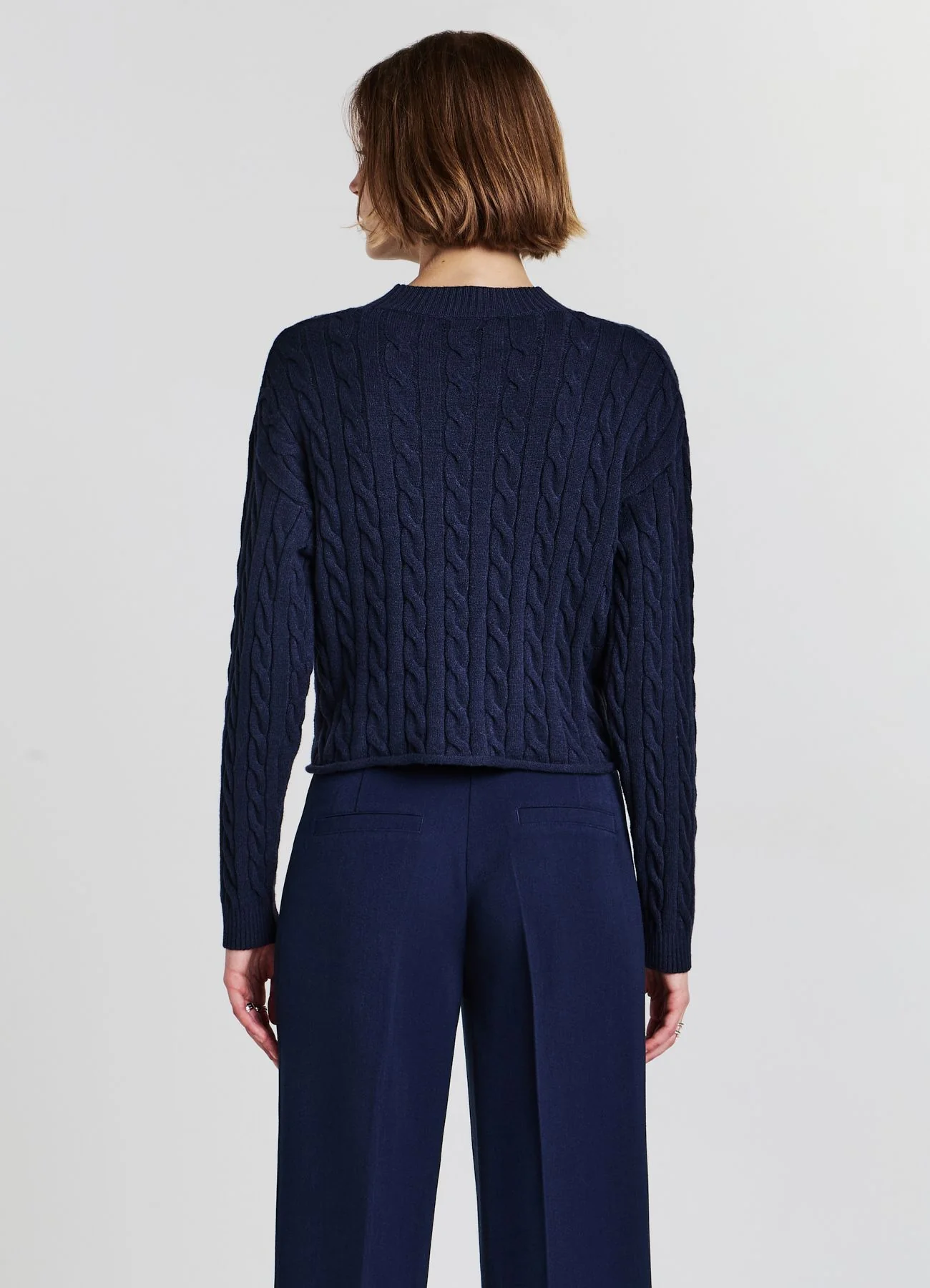 Maglia crop con trecce