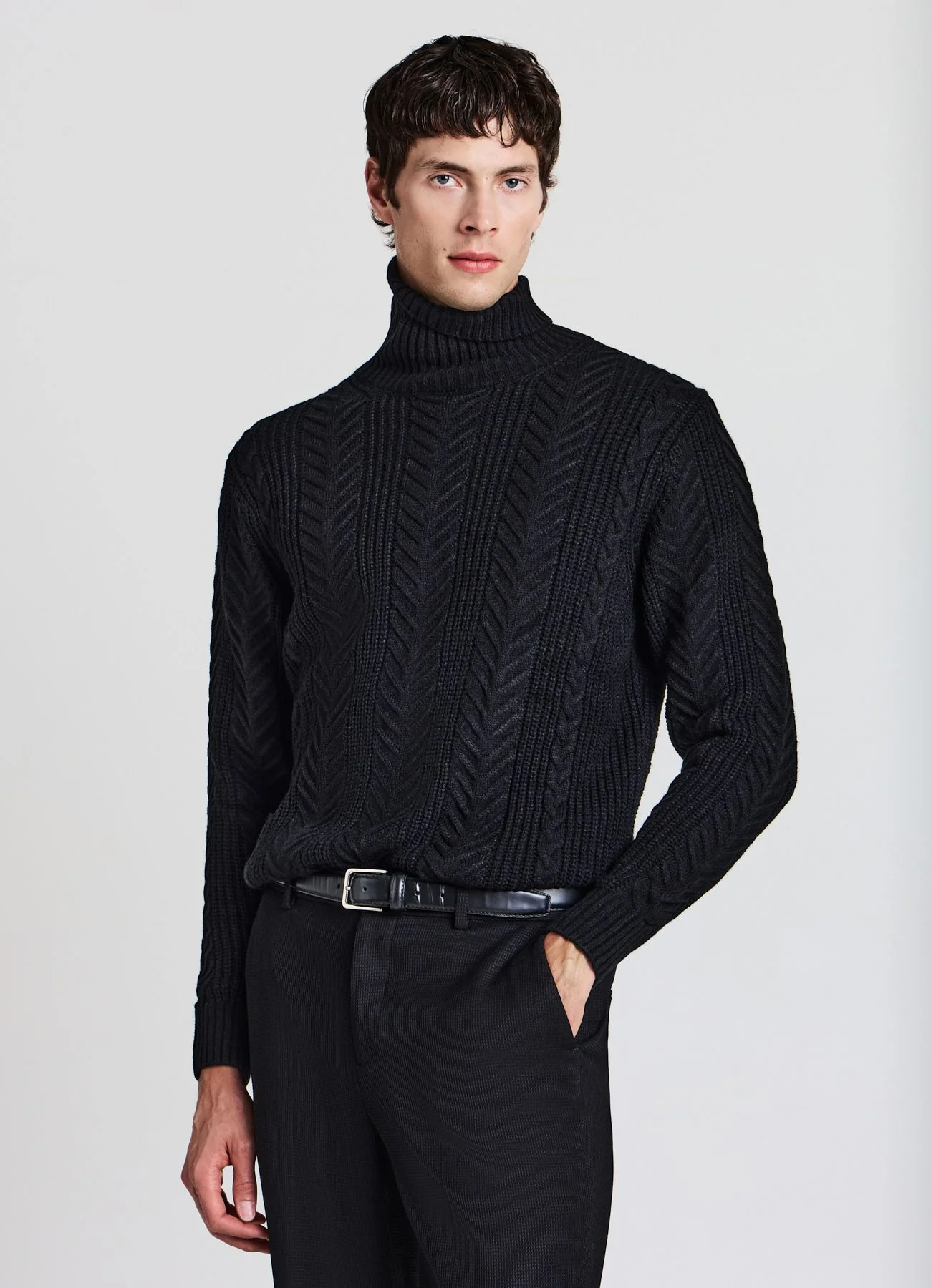 Maglia dolcevita a trecce