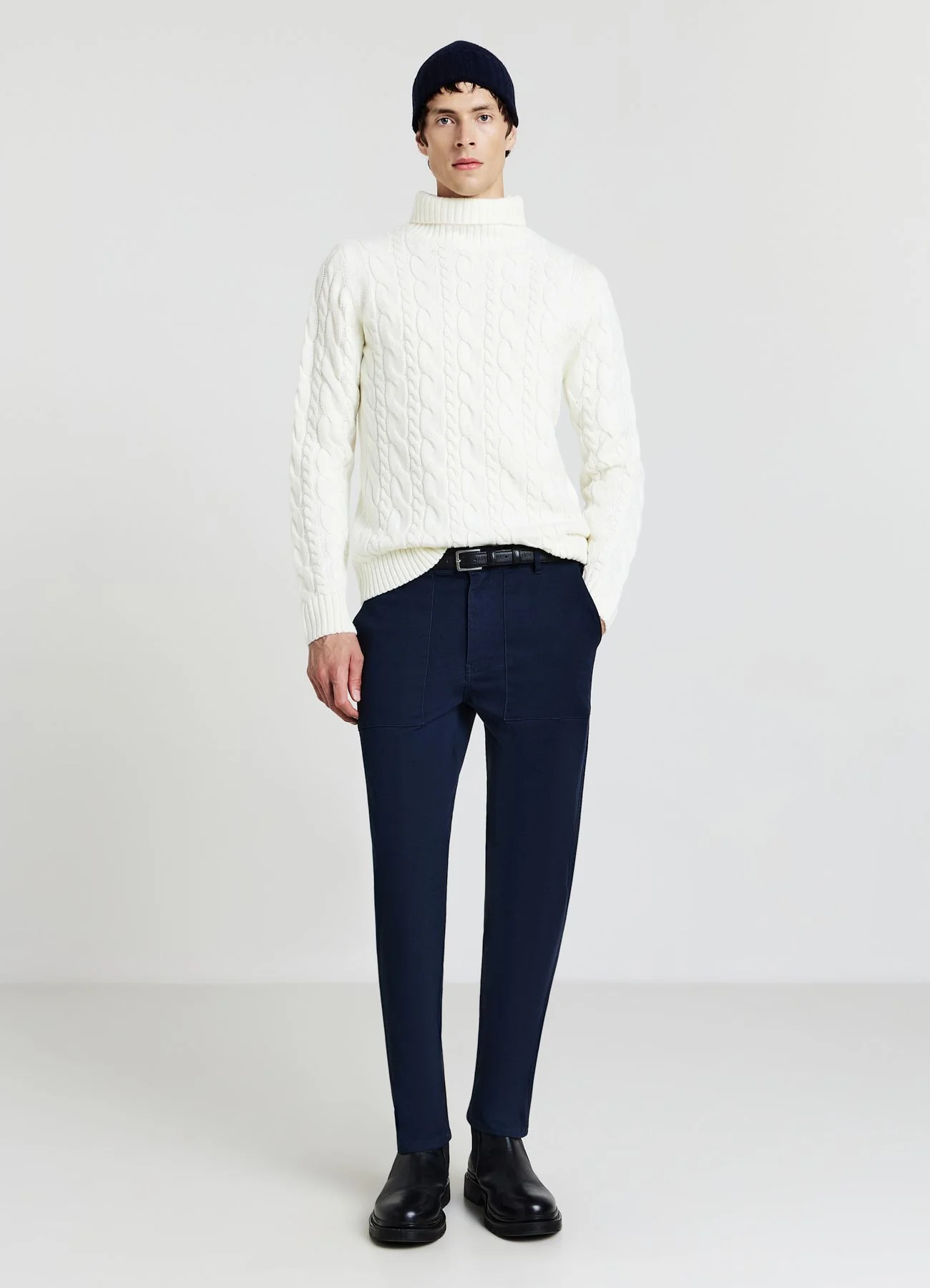Maglione dolcevita con trecce