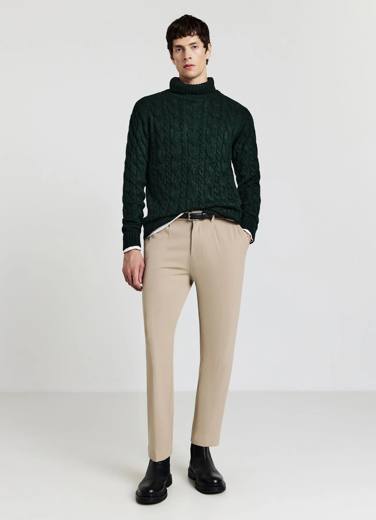 Maglione dolcevita con trecce