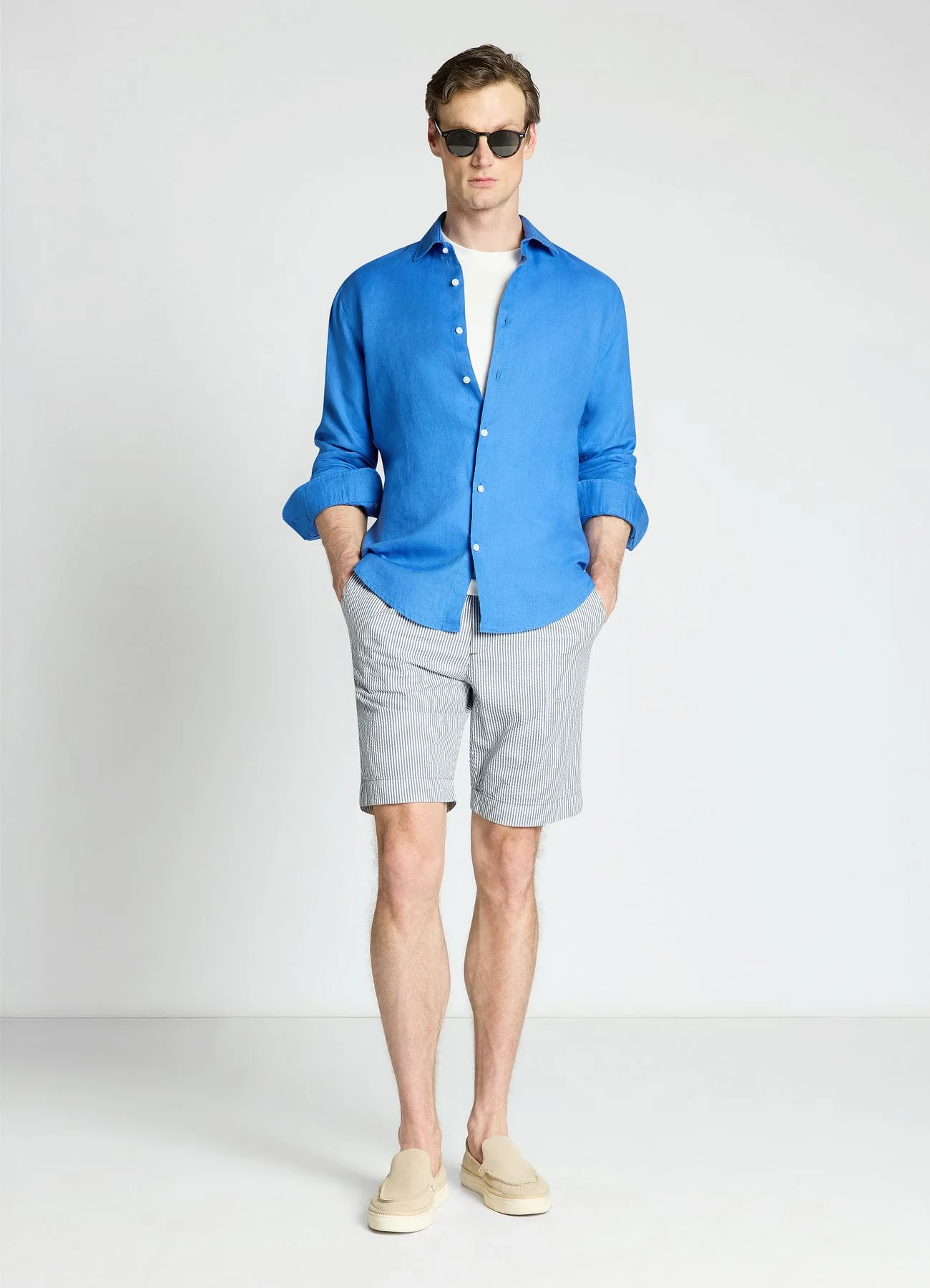 Pantaloncini bermuda a righe con risvolto