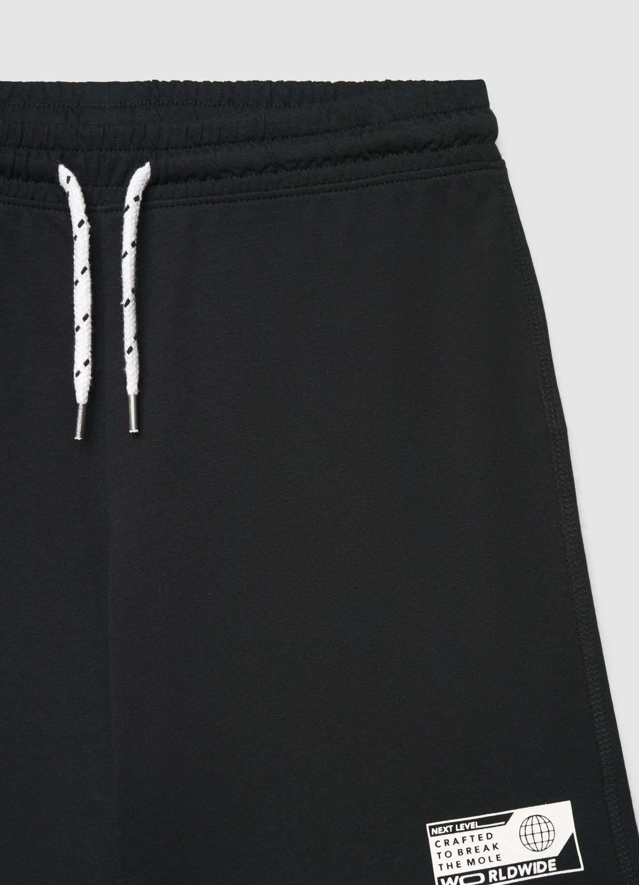 Pantaloncini ginnici over con coulisse e stampa - Image 3