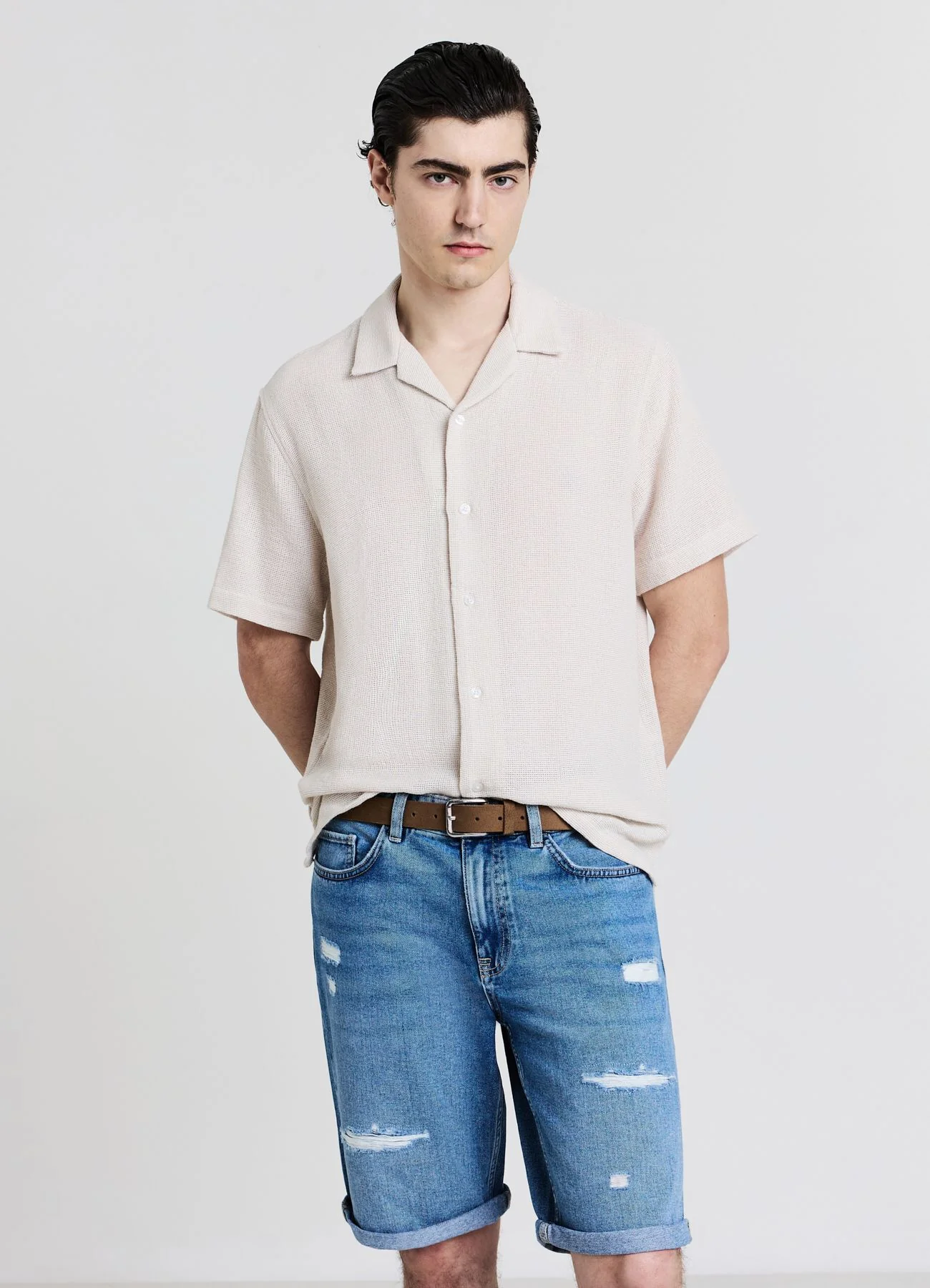Pantaloncini jeans con strappi