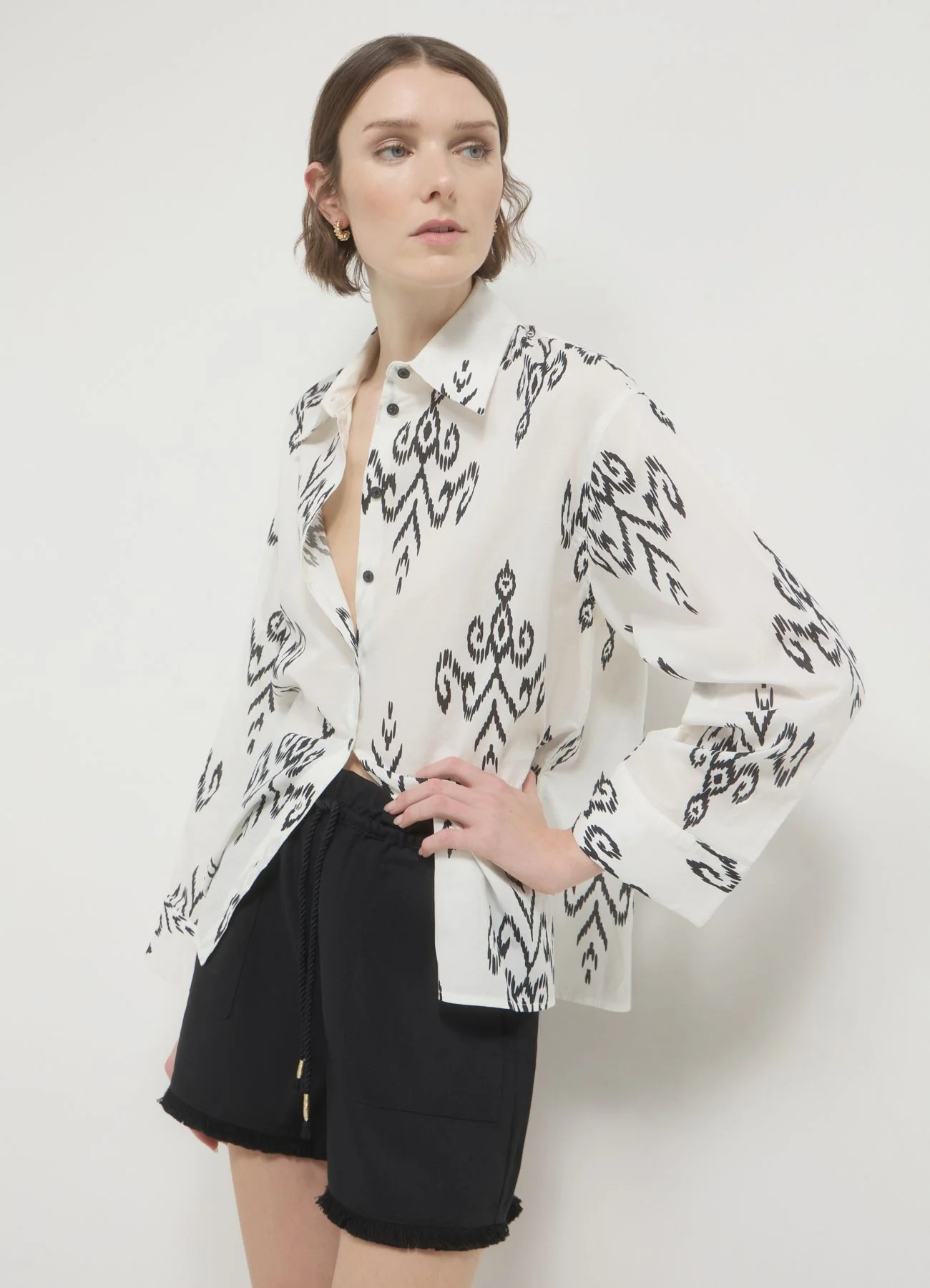 Pantaloncini misto lino frange