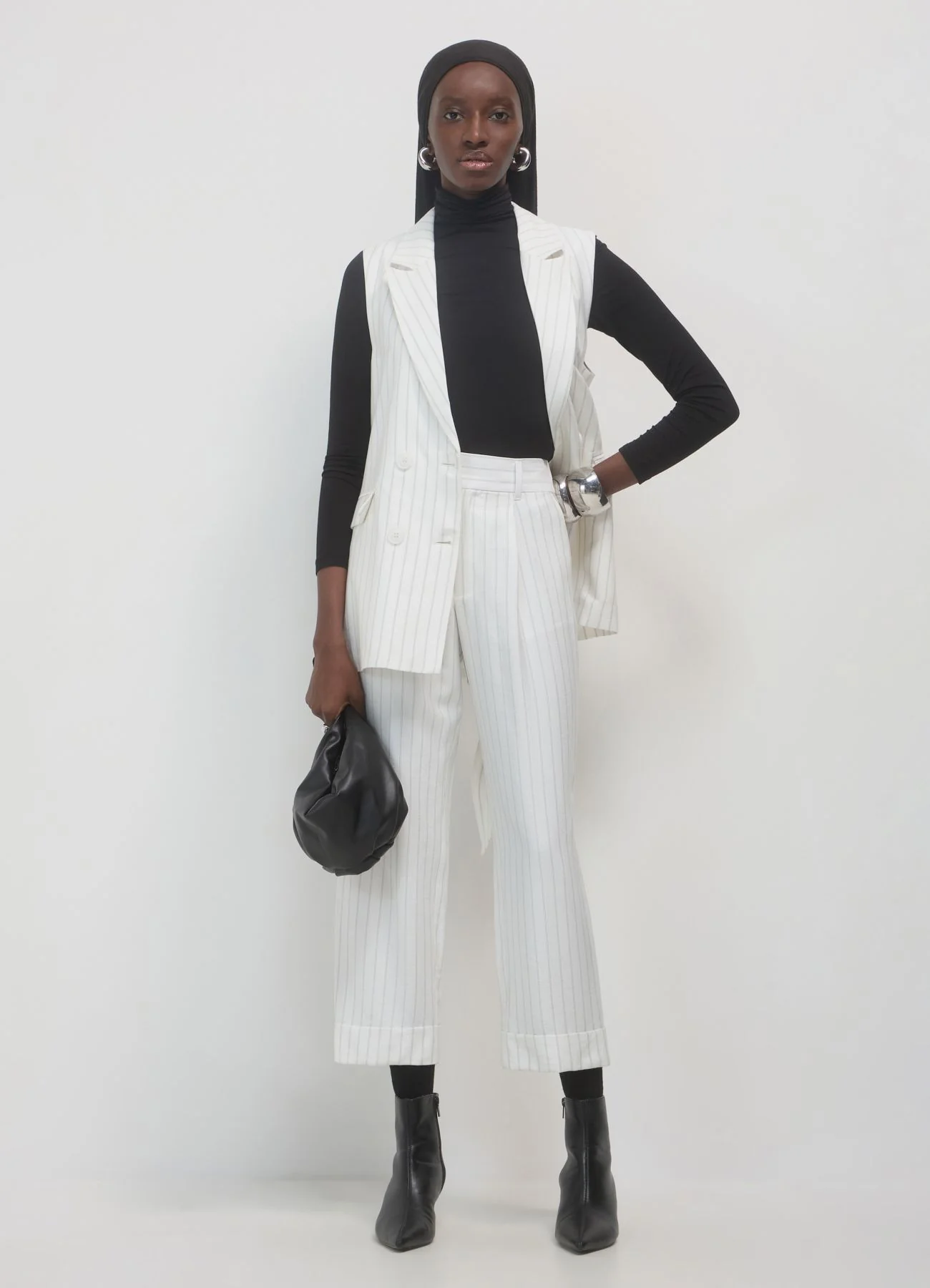 Pantalone classico a righe con risvolto