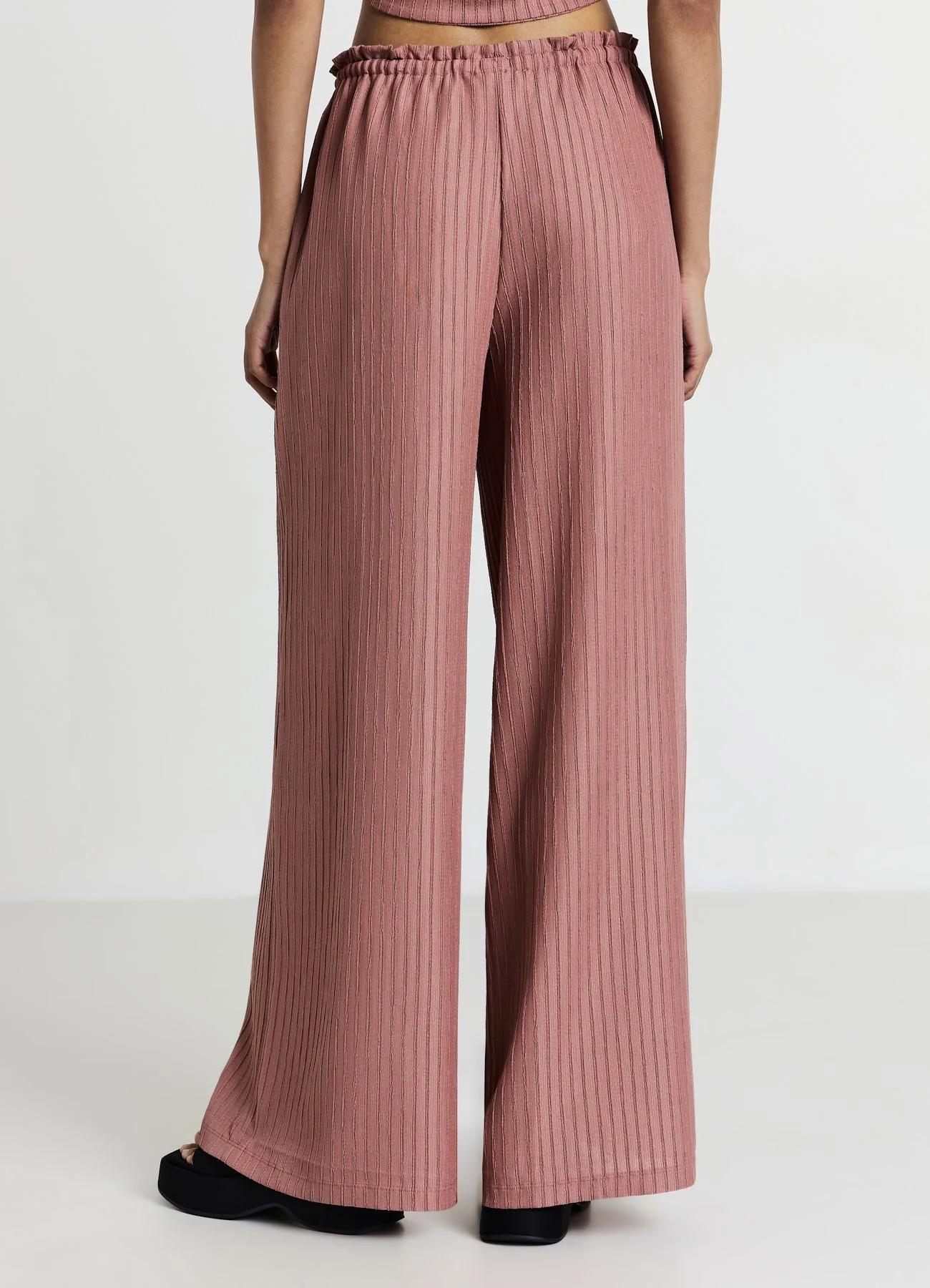 Pantalone palazzo tessuto in rilievo