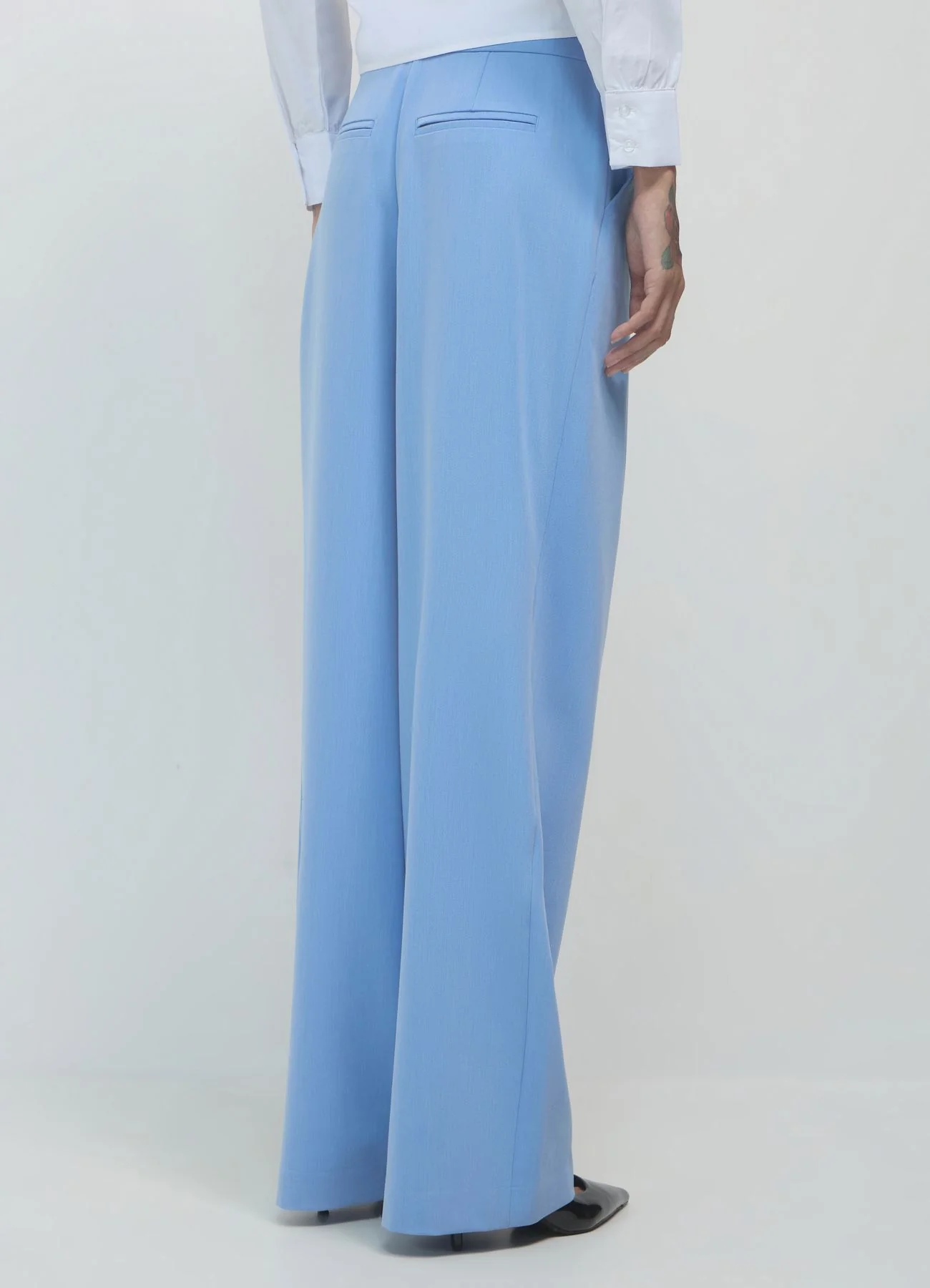 Pantaloni a palazzo con taschino