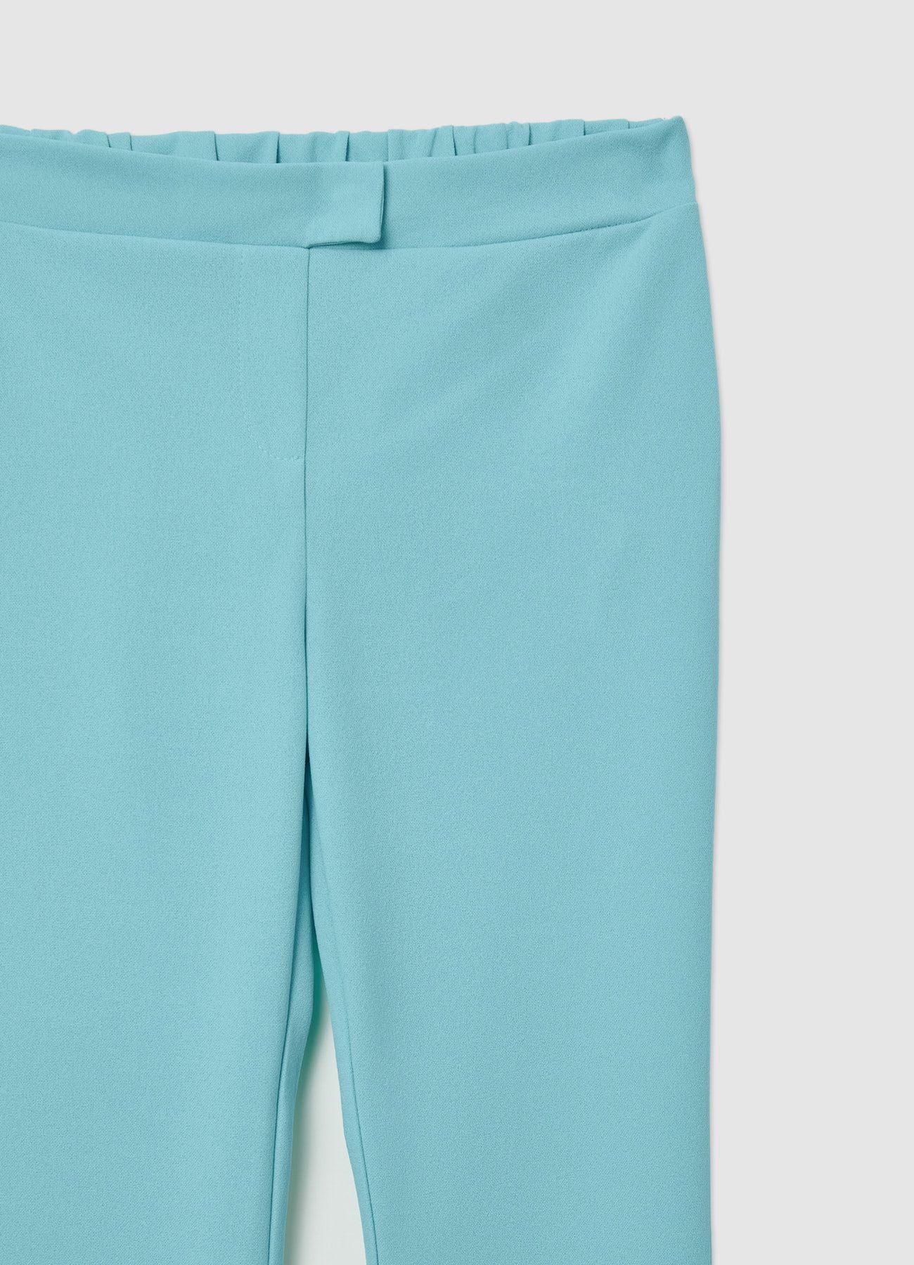Pantaloni a zampa tinta unita