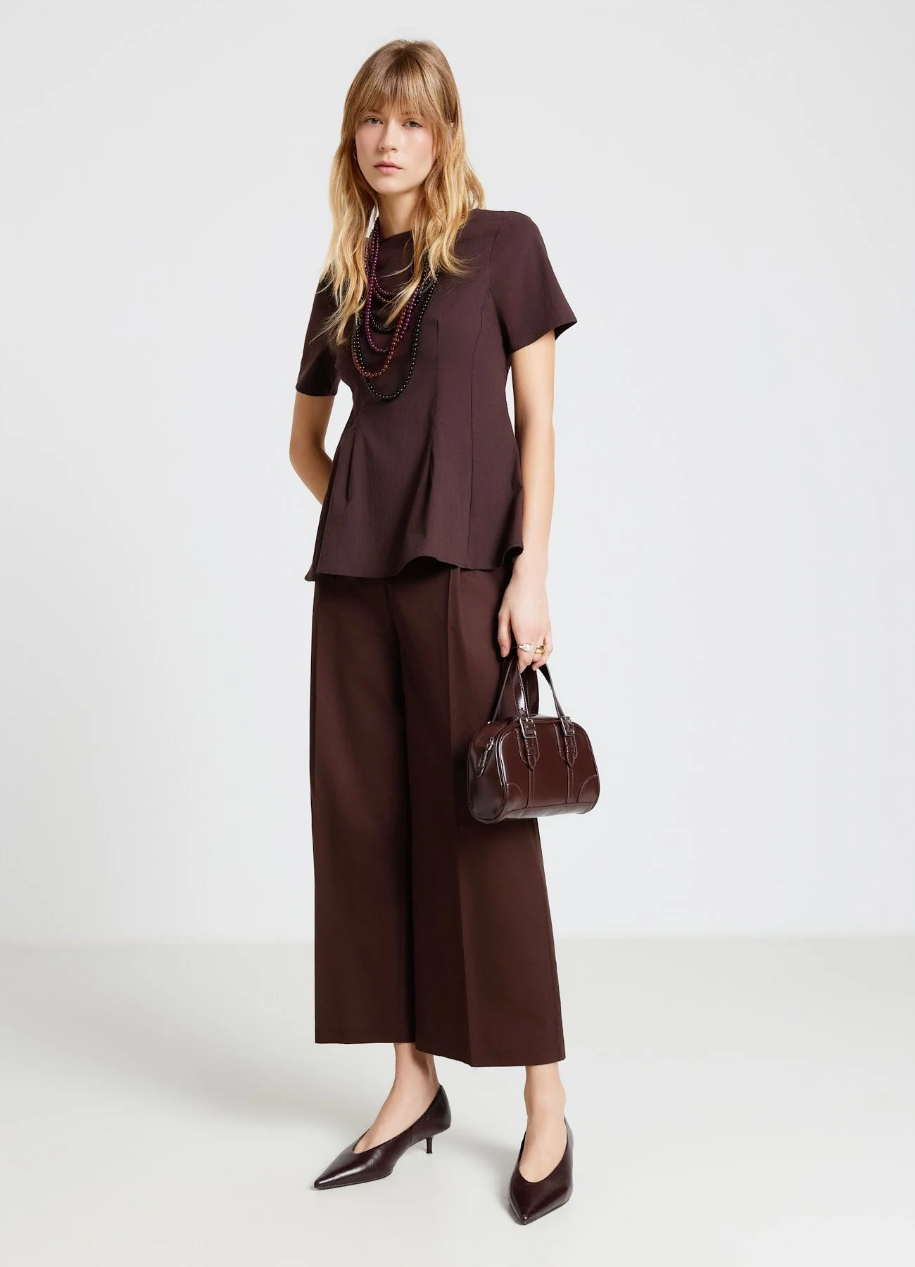 Pantaloni crop palazzo con pinces