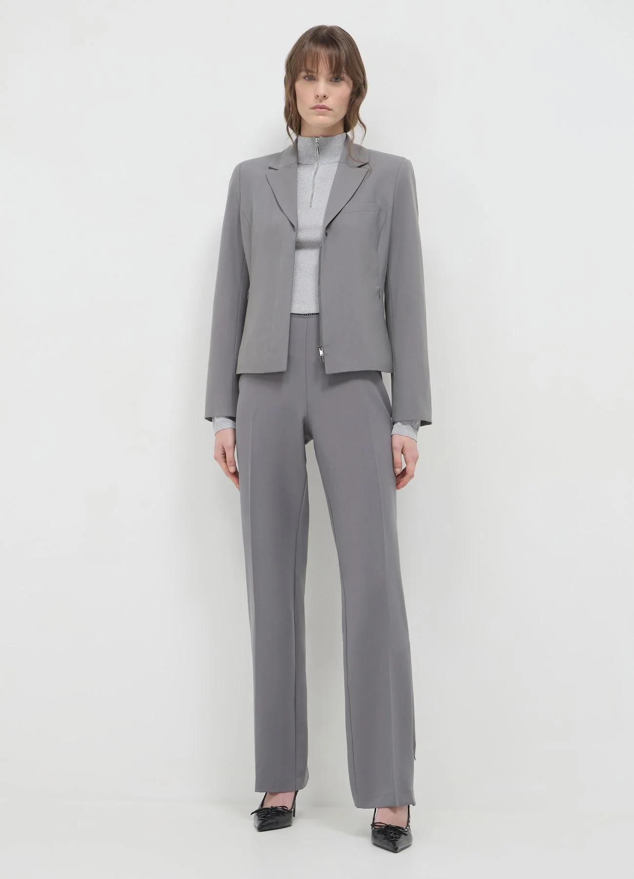 Pantaloni slim con merletto