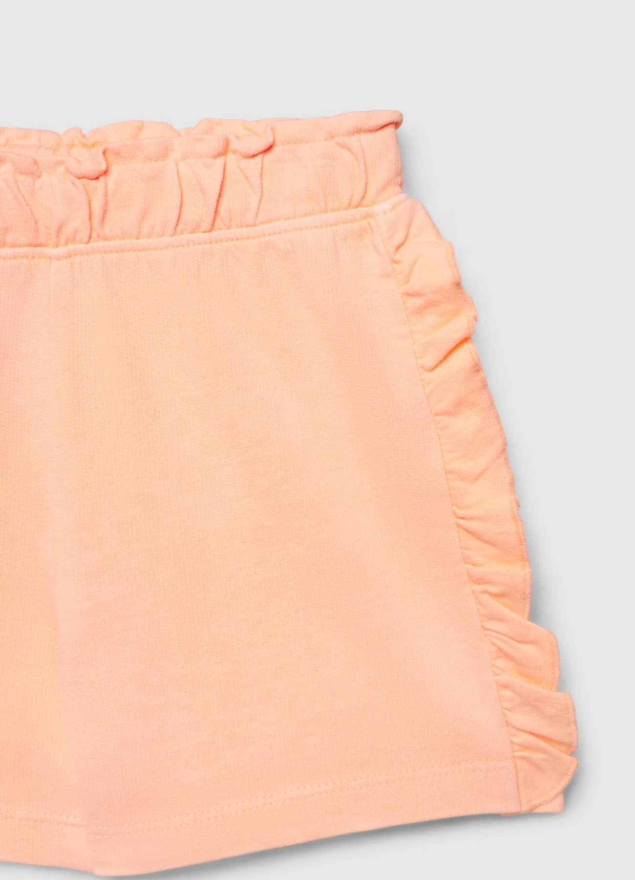 Shorts ginnici con rouches
