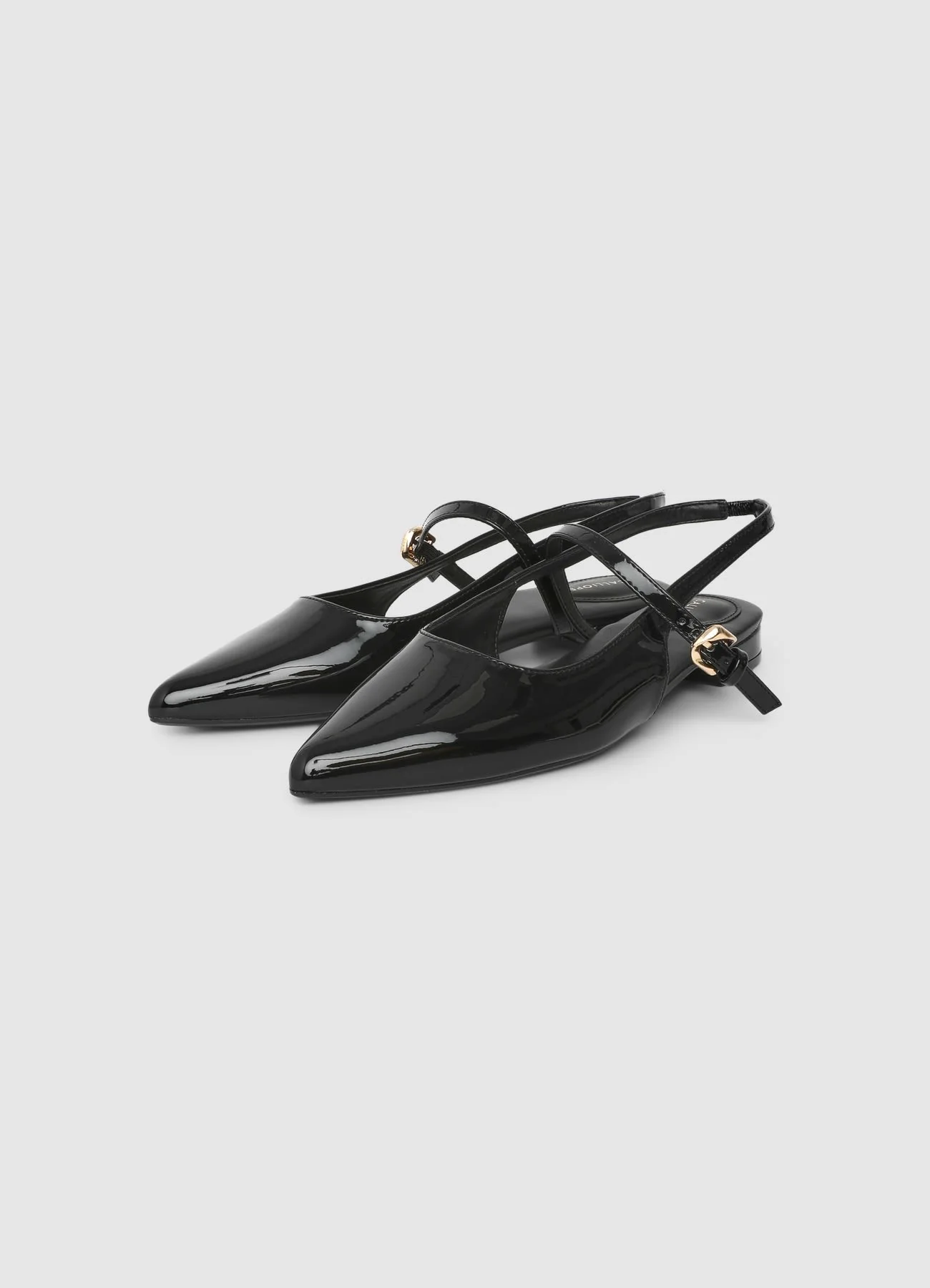 Slingback flat a punta con cinturini