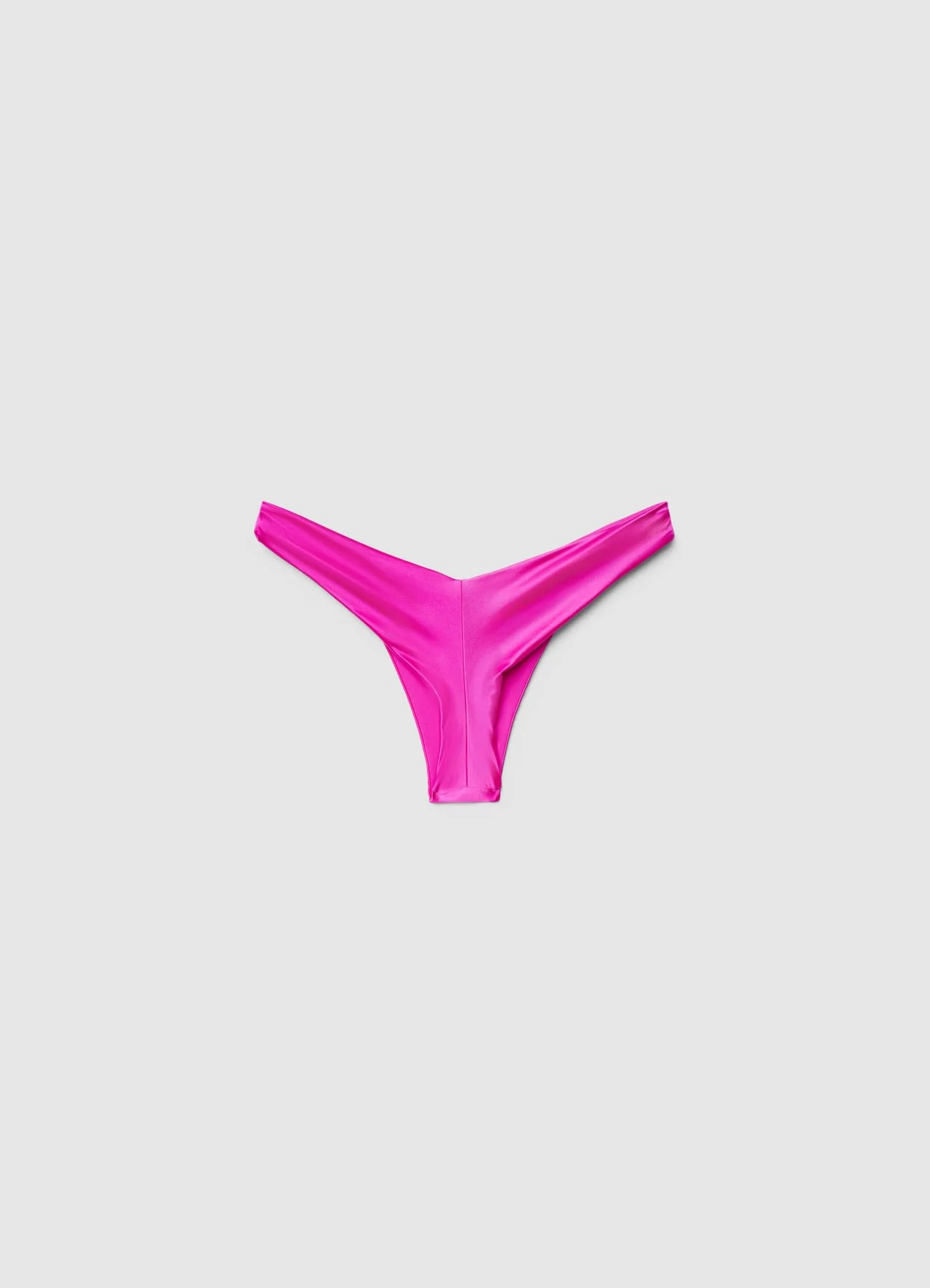 Slip bikini brasiliana con nodi a tinta unita