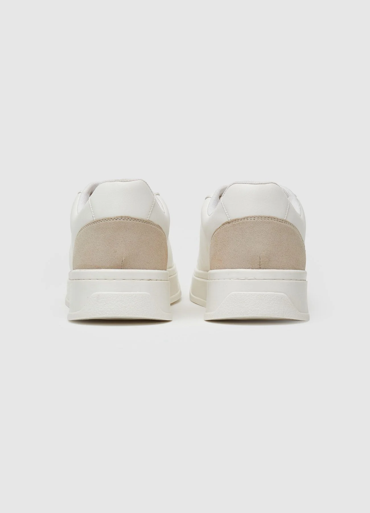 Sneakers con suola alta