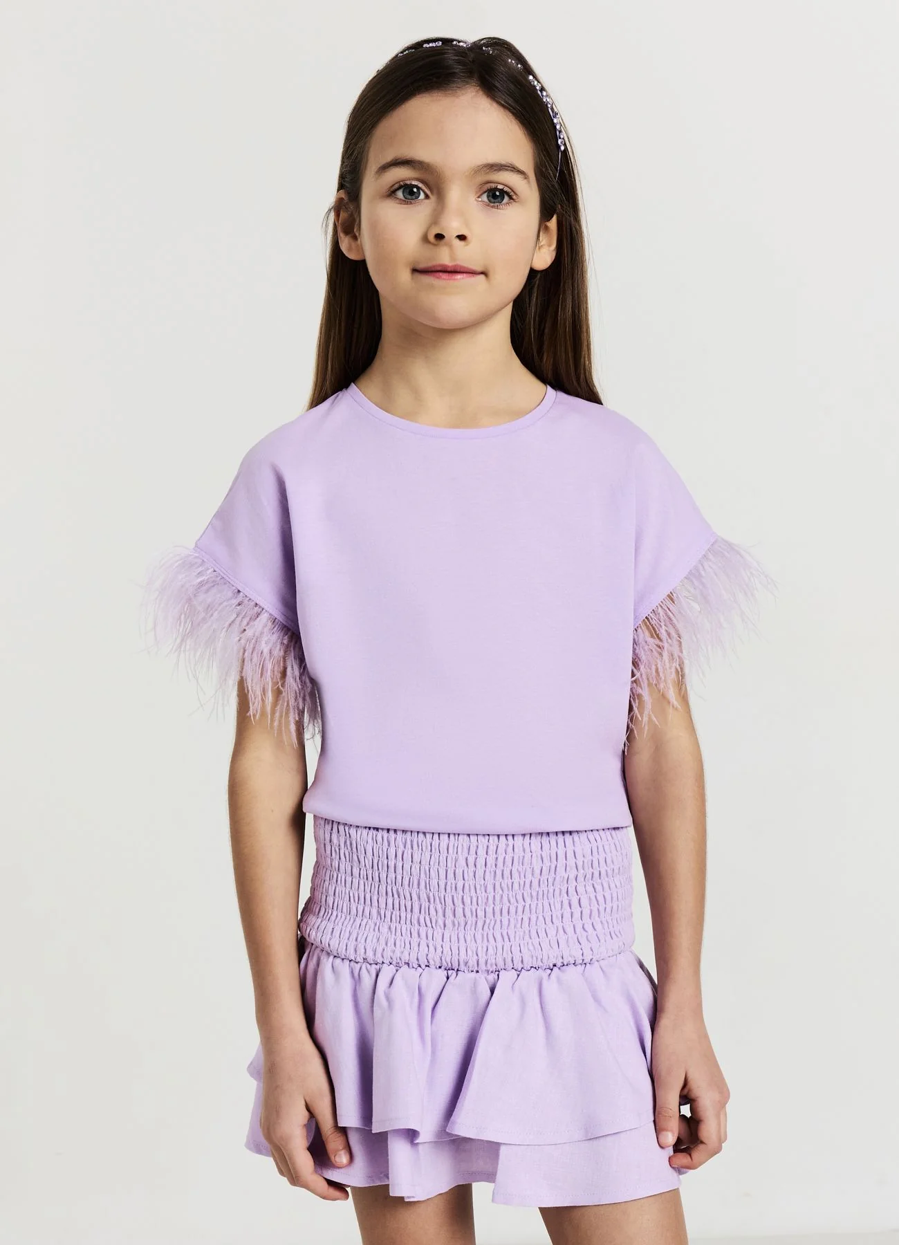 T-shirt maniche con piume