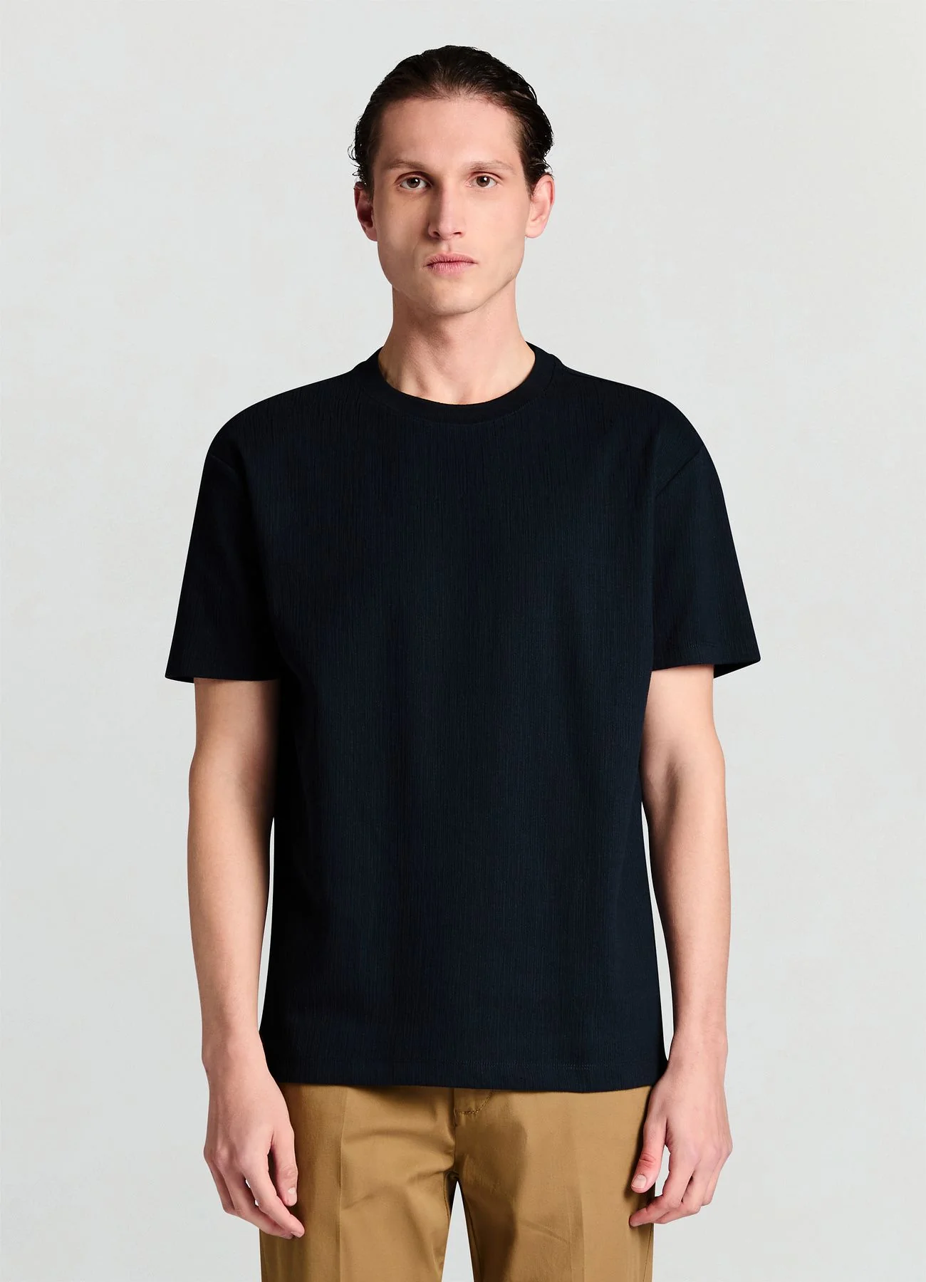T-shirt operata a tinta unita