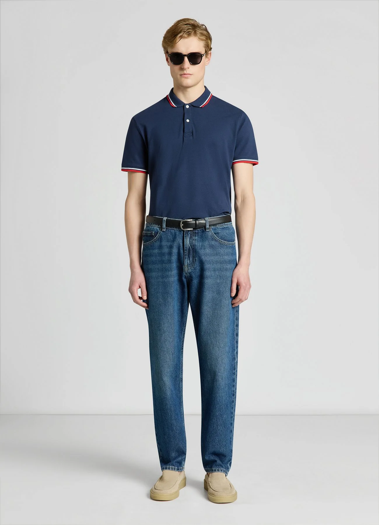 T-shirt polo con profili a righe
