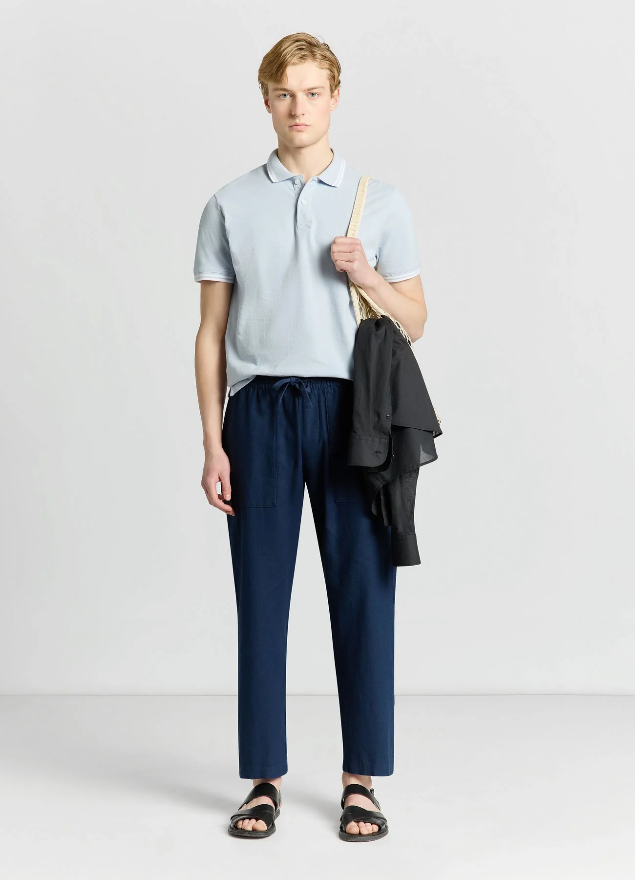 T-shirt polo con profili a righe