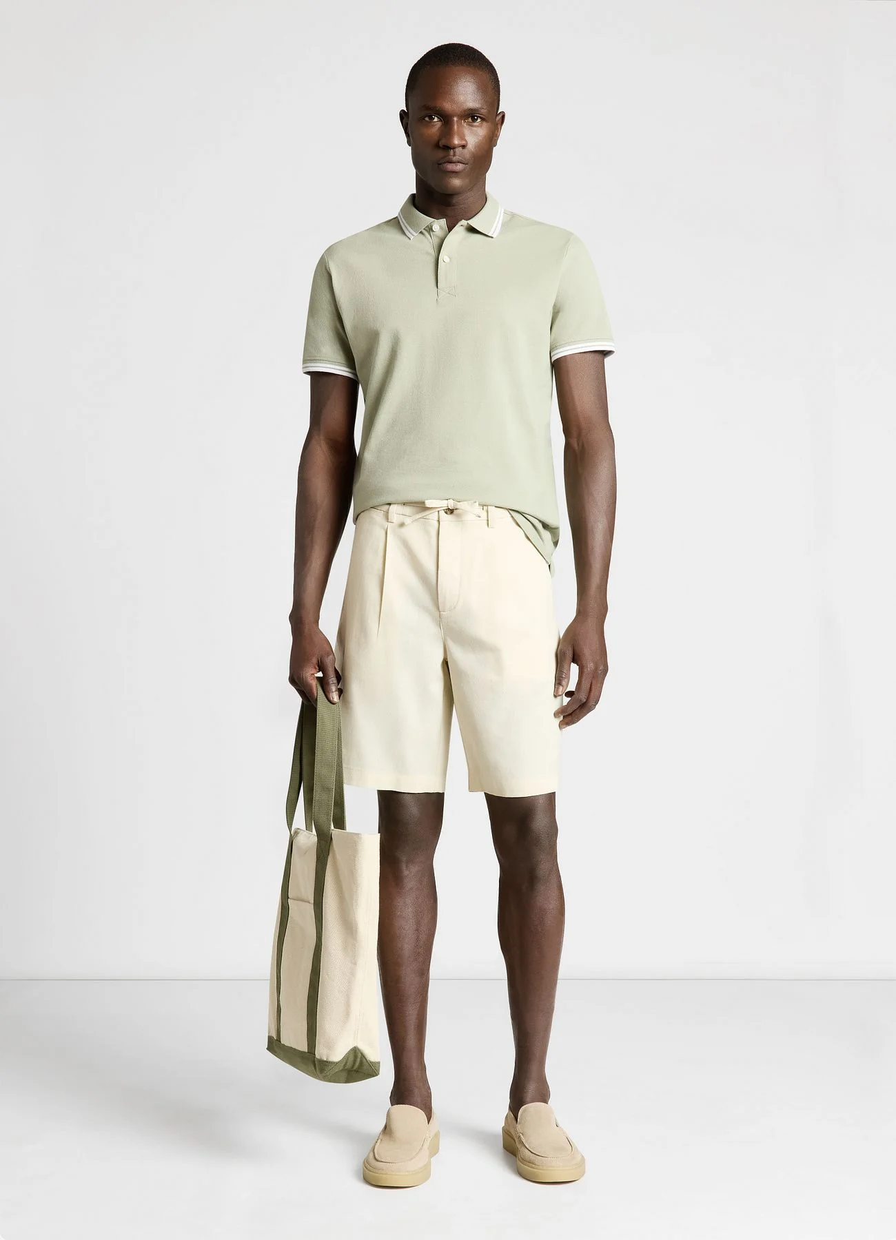 T-shirt polo con profili a righe