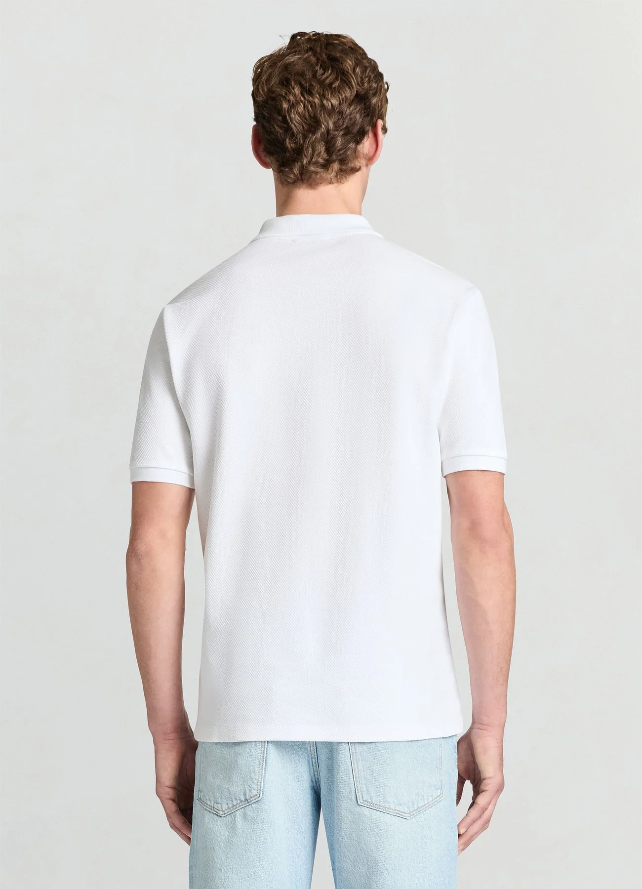 T-shirt polo tessuto operato