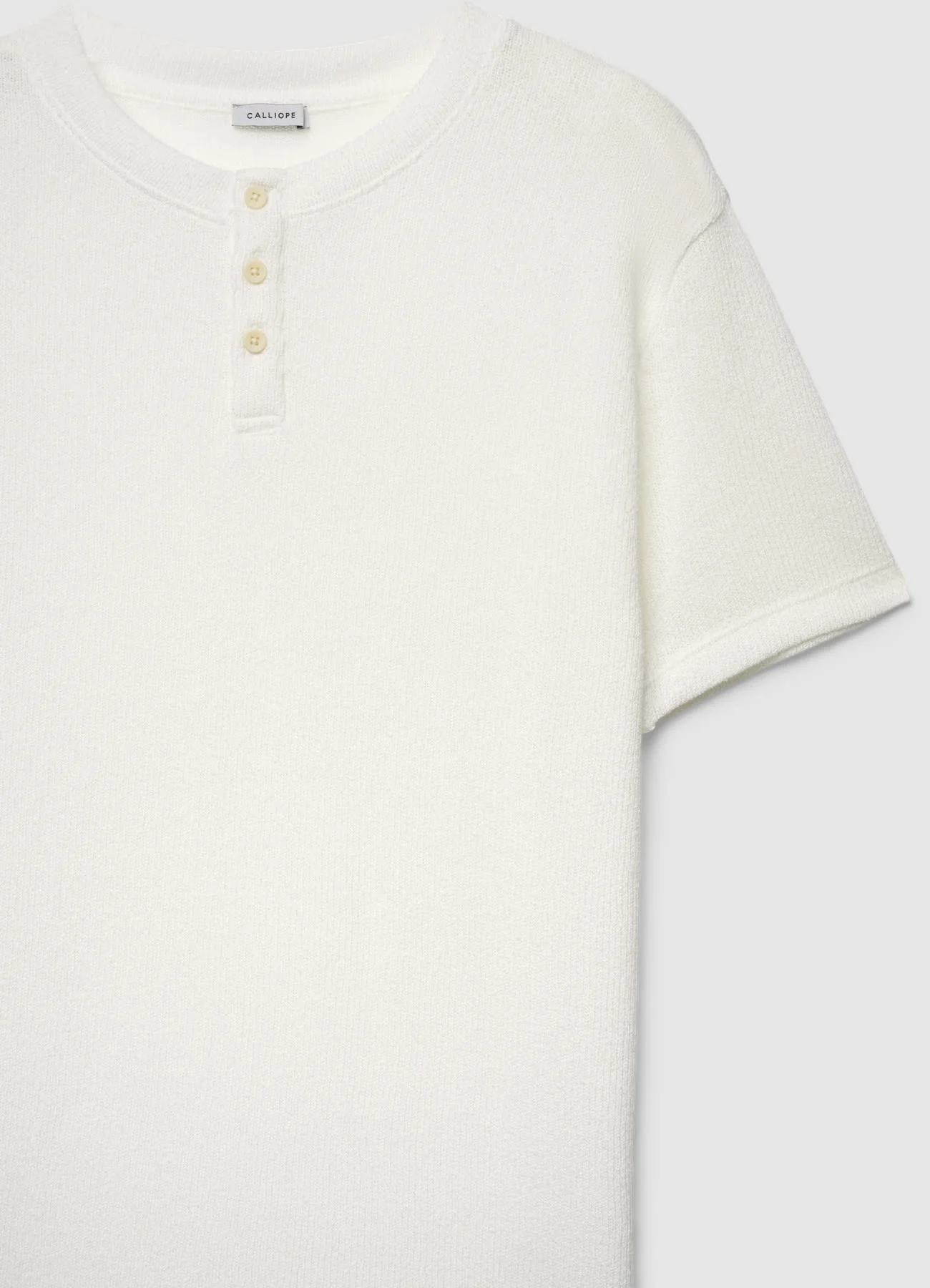 T-shirt serafino traforata a tinta unita