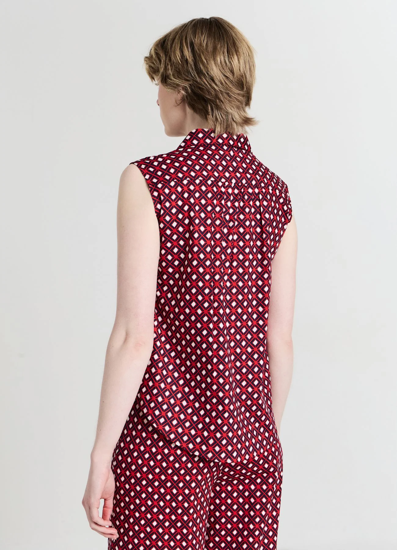Top collo camicia a fantasia