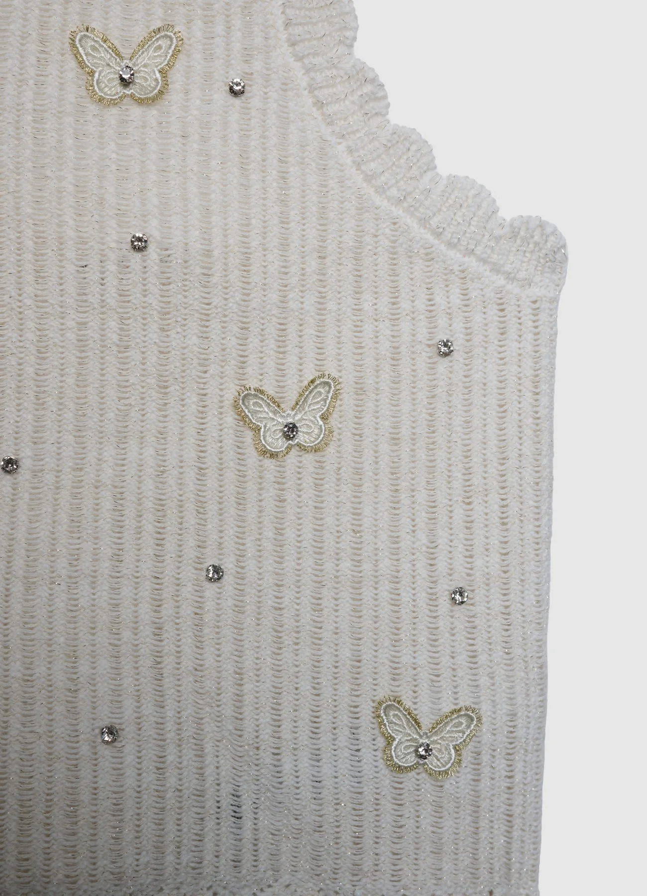 Top crochet con farfalle e strass