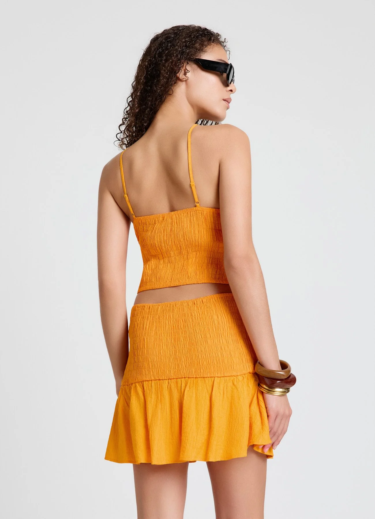 Top smock con spalline sottili incrociate